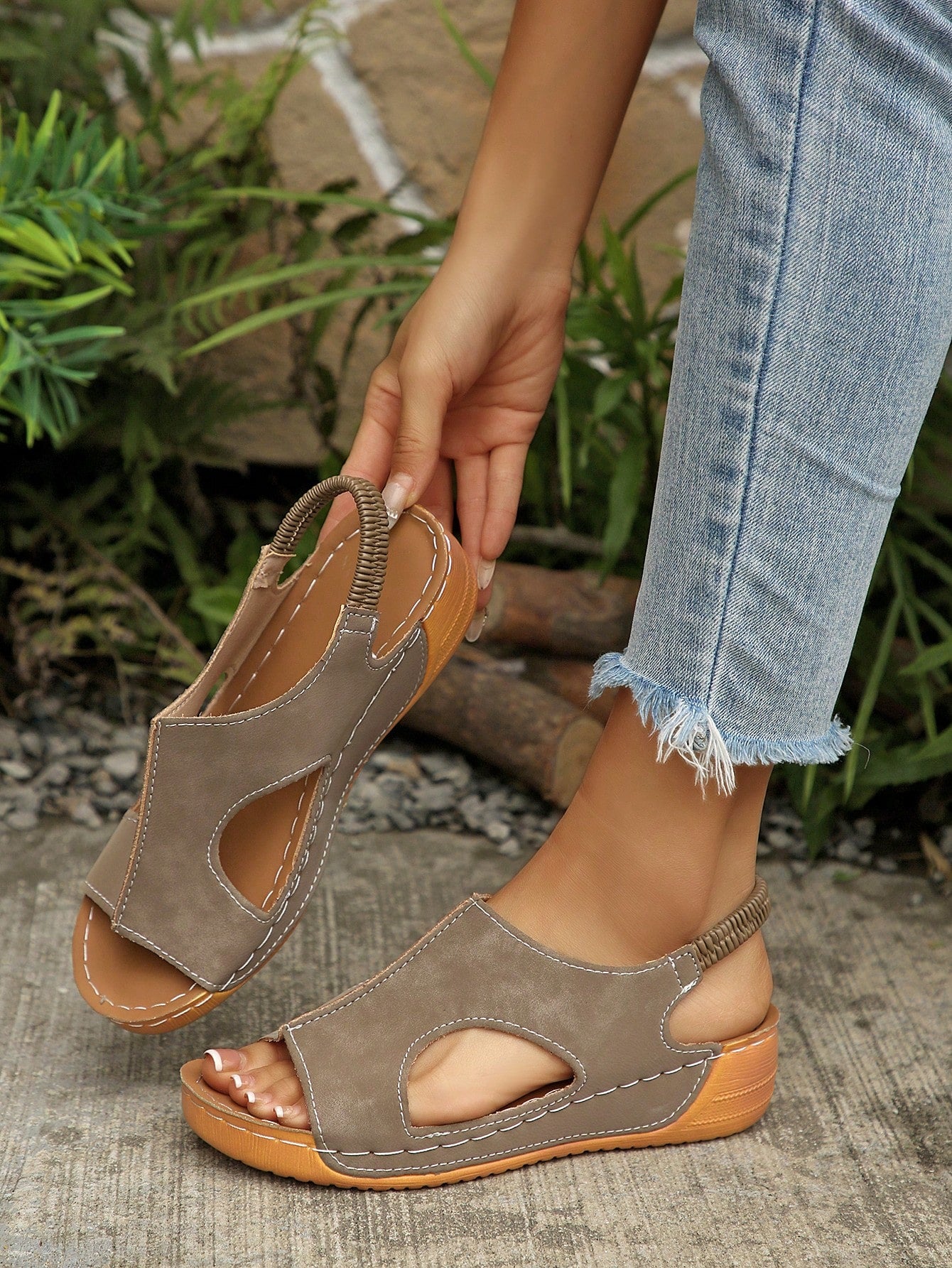 Women’s white PU platform wedge sandals with slip-on design, slingback strap, open round toe, and cut-out details, suitable for beach and vacation wear.