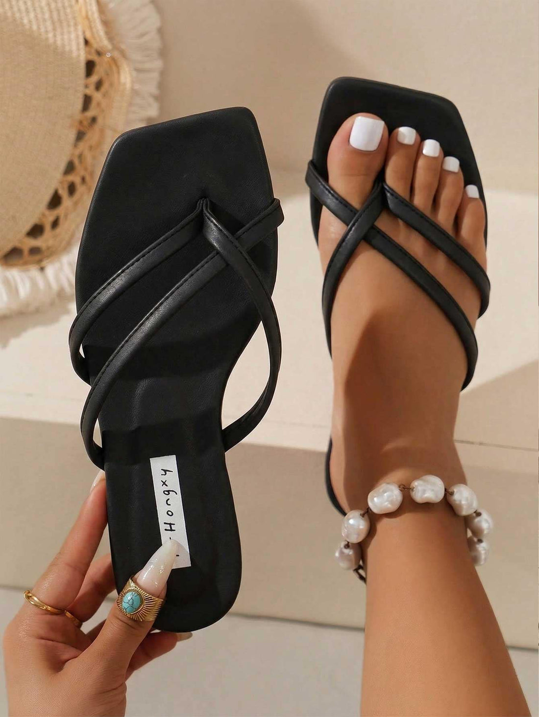 Women’s black flat slide sandals with square toe, open toe, and slip-on design in textured PU leather, suitable for casual beach, indoor, and outdoor summer wear.