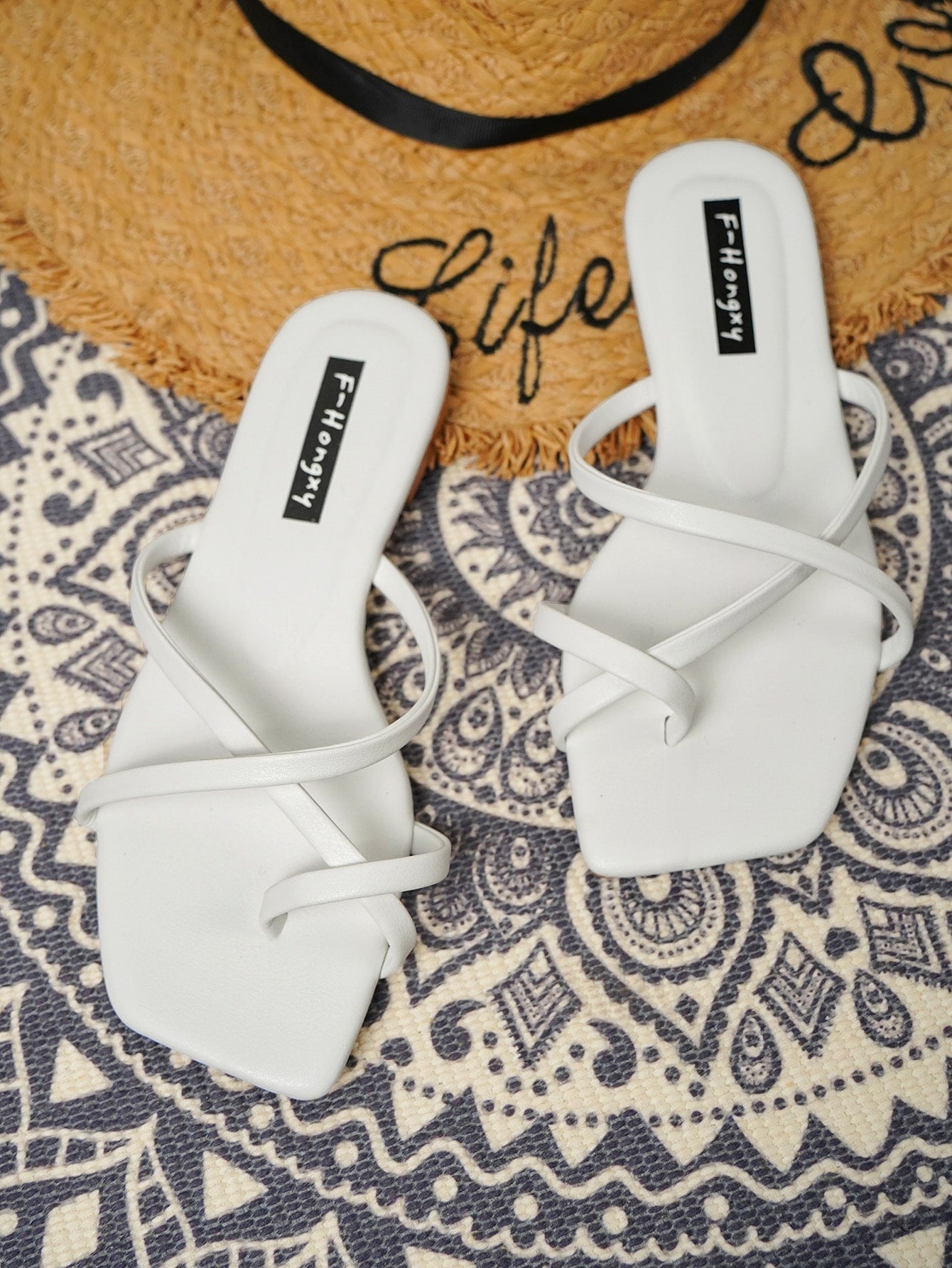 Women's striped flat slingback sandals with a square open toe, slip-on style, and rhinestone detail.