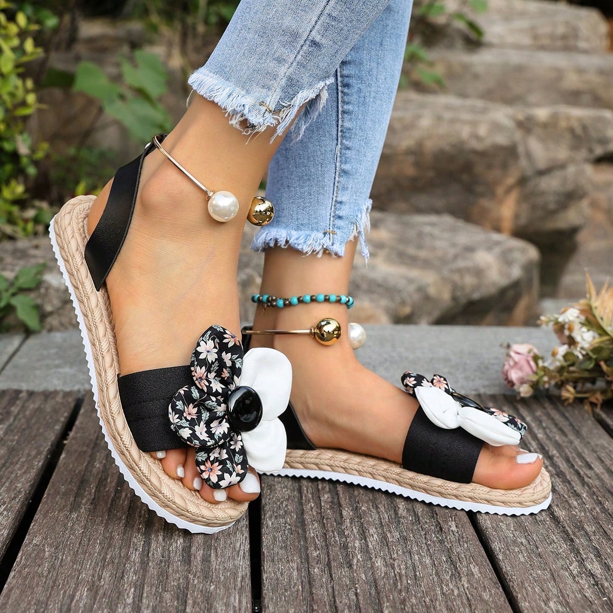Women's floral beach slip-on flat sandals with soft non-slip sole and classic open sandal design in beige.