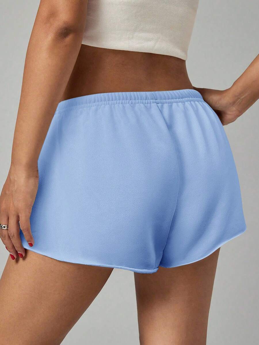 Petite women's burgundy casual track shorts with drawstring waist, raw hem, loose fit, and mini length