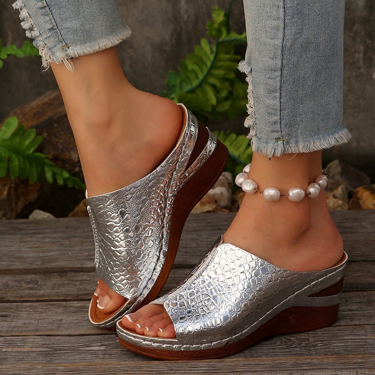 Women’s open-toe wedge slide sandals with hollow-out detail and plain design, one-piece PU leather upper, suitable for outdoor wear.