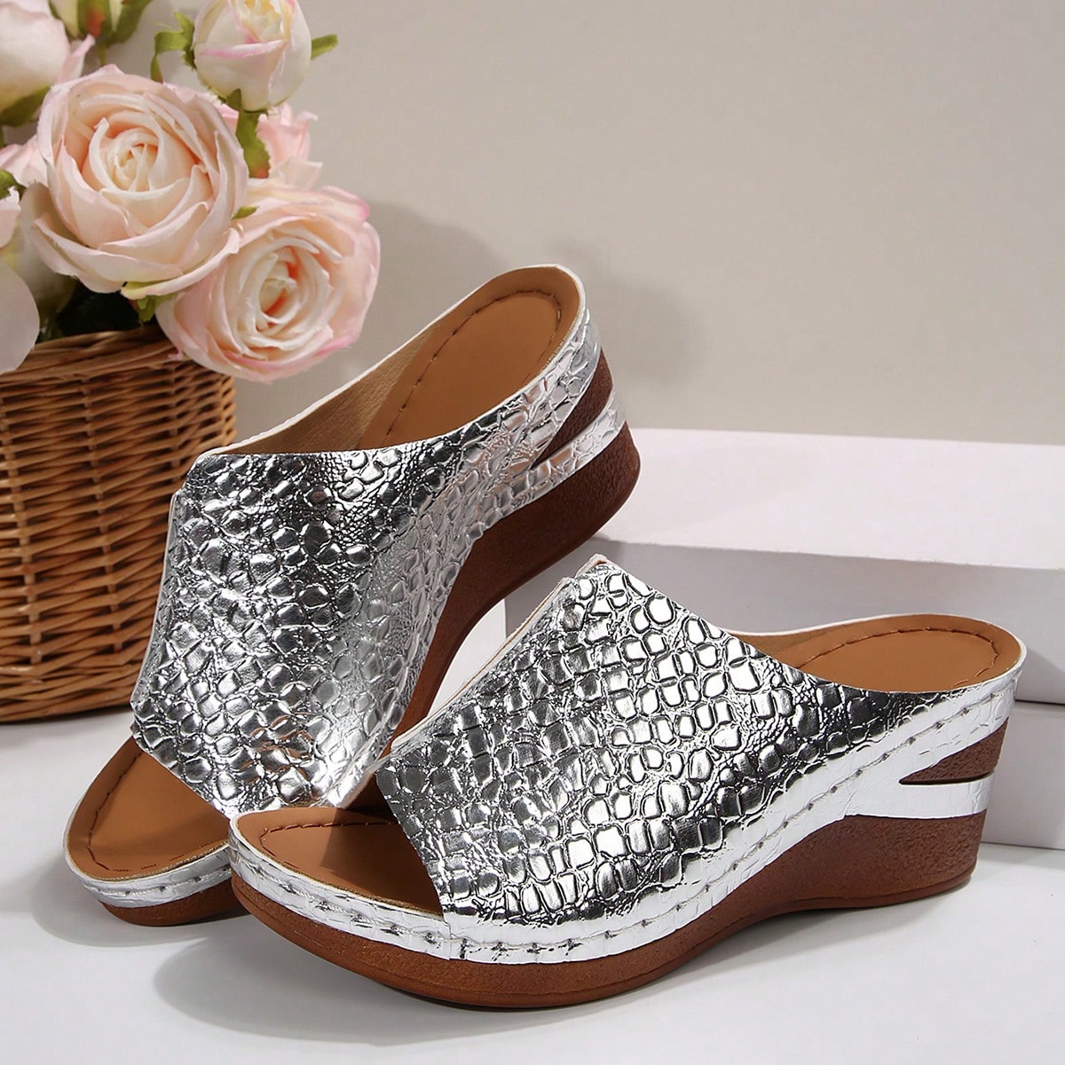 Women’s open-toe wedge slide sandals with hollow-out detail and plain design, one-piece PU leather upper, suitable for outdoor wear.