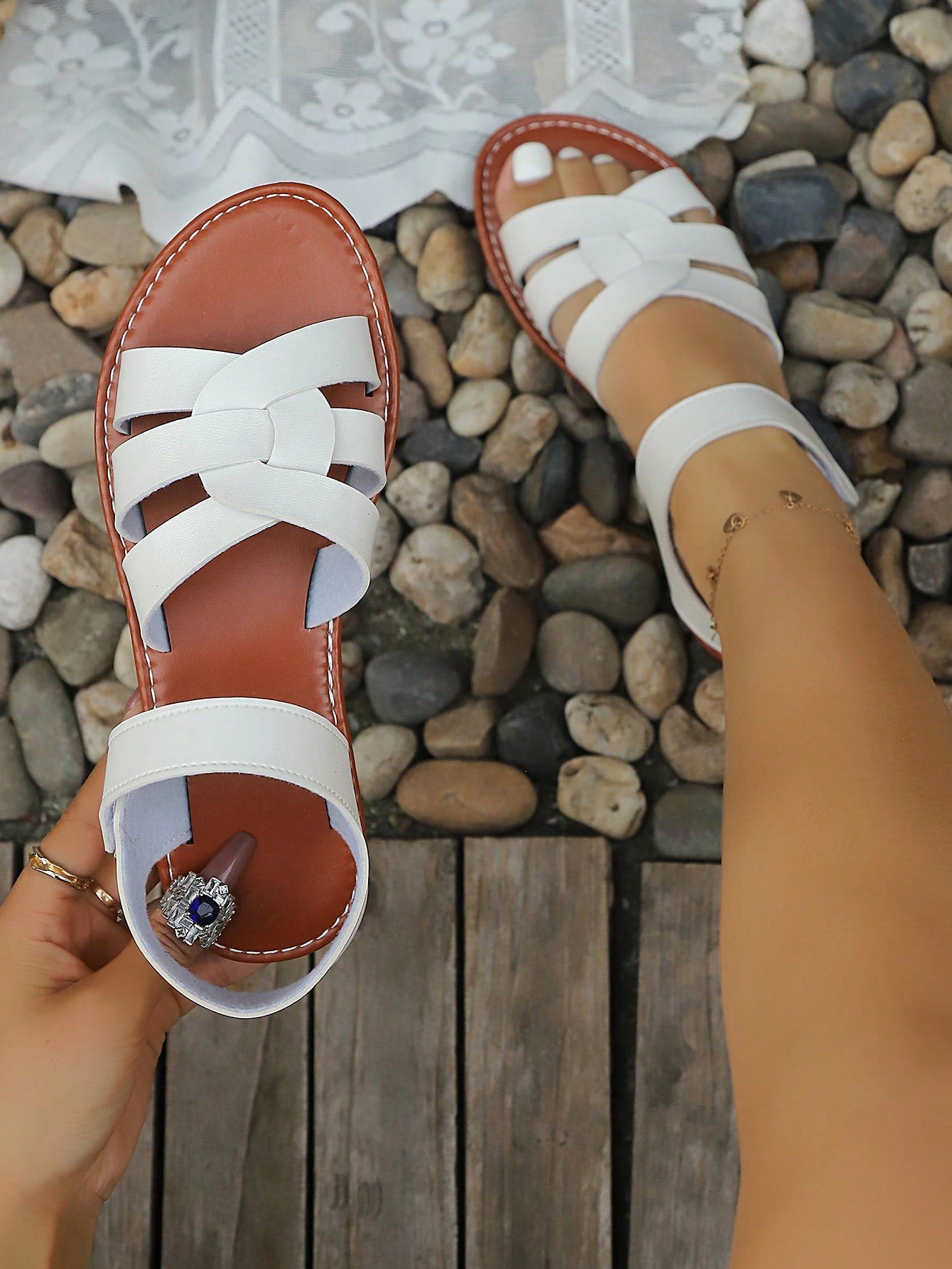 Plus size women's flat sandals with criss-cross straps and open toe, featuring a classic casual style for beach, vacation, commute, and everyday wear.