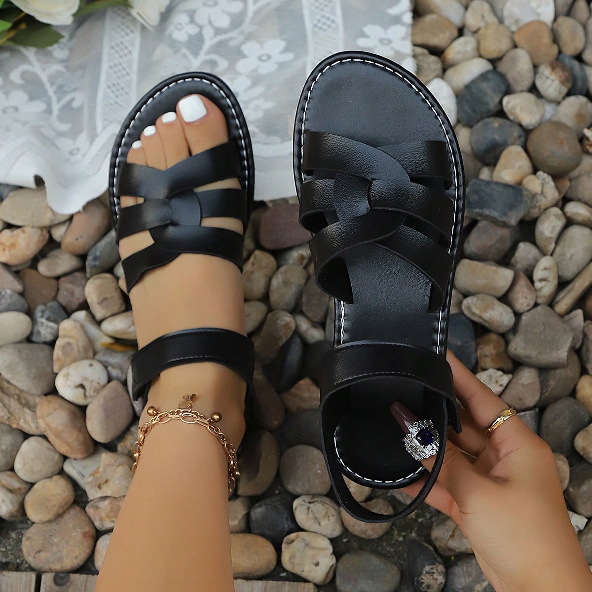 Plus size women's flat sandals with criss-cross straps and open toe, featuring a classic casual style for beach, vacation, commute, and everyday wear.
