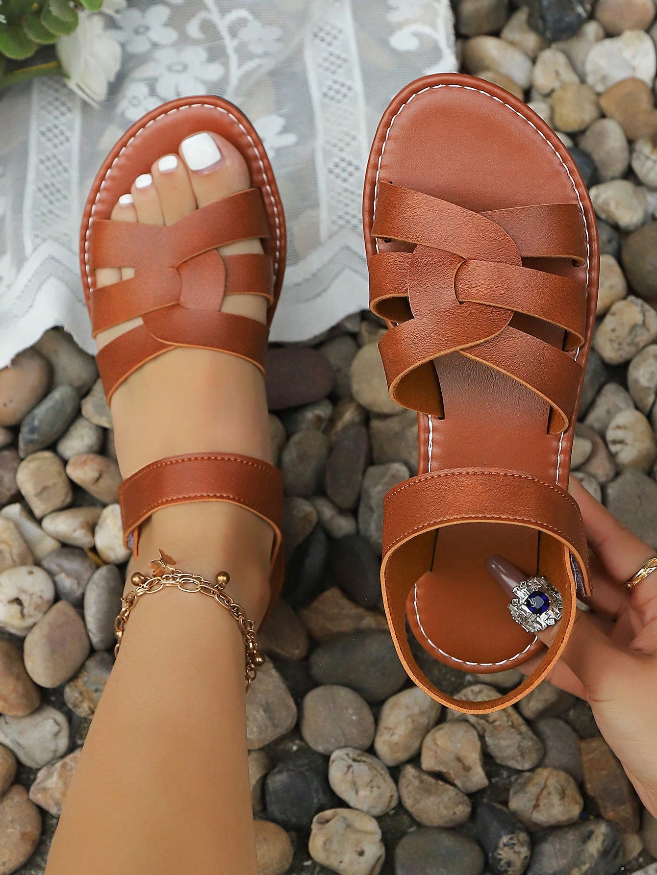 Plus size women's flat sandals with criss-cross straps and open toe, featuring a classic casual style for beach, vacation, commute, and everyday wear.