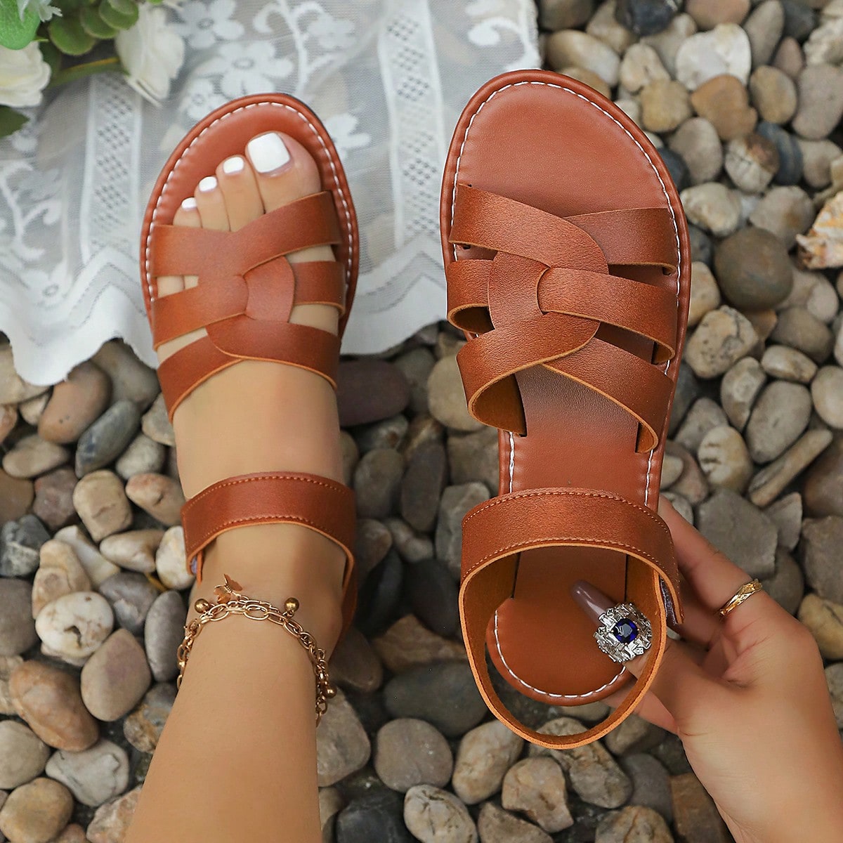 Plus size women's flat sandals with criss-cross straps and open toe, featuring a classic casual style for beach, vacation, commute, and everyday wear.