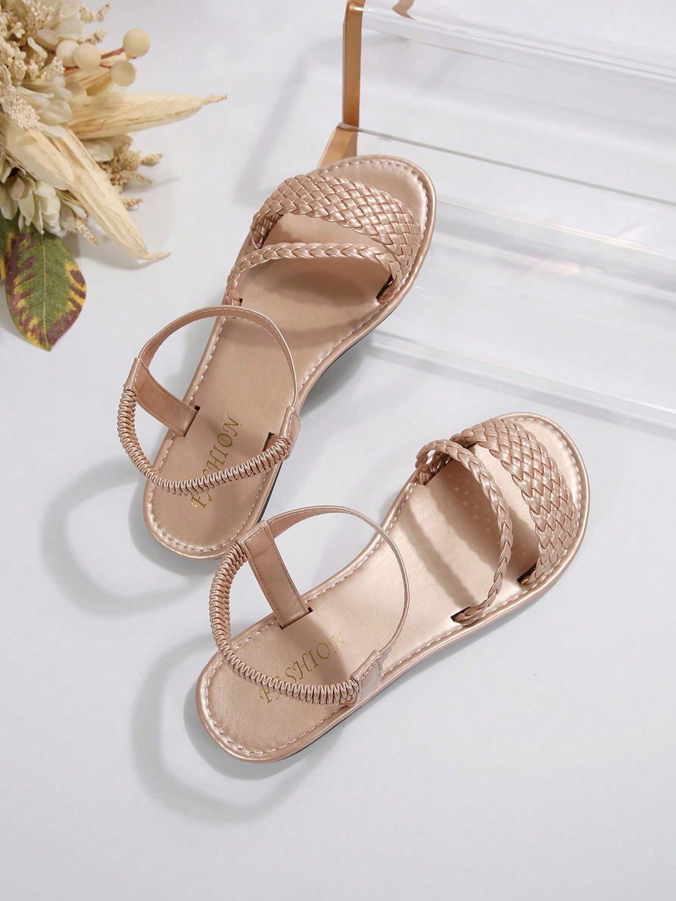 Women's plus size flat slide sandals with woven braid detail, open toe design, and elastic band strap, suitable for casual outdoor, beach, and vacation wear.