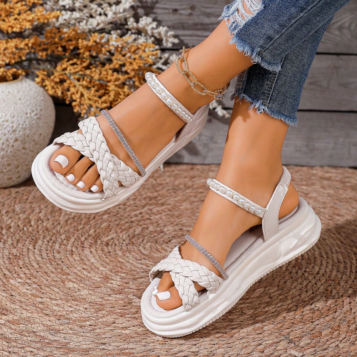 Women's platform wedge sandals with pearl detail, open toe, ankle strap, and chunky sole in a slip-on style.