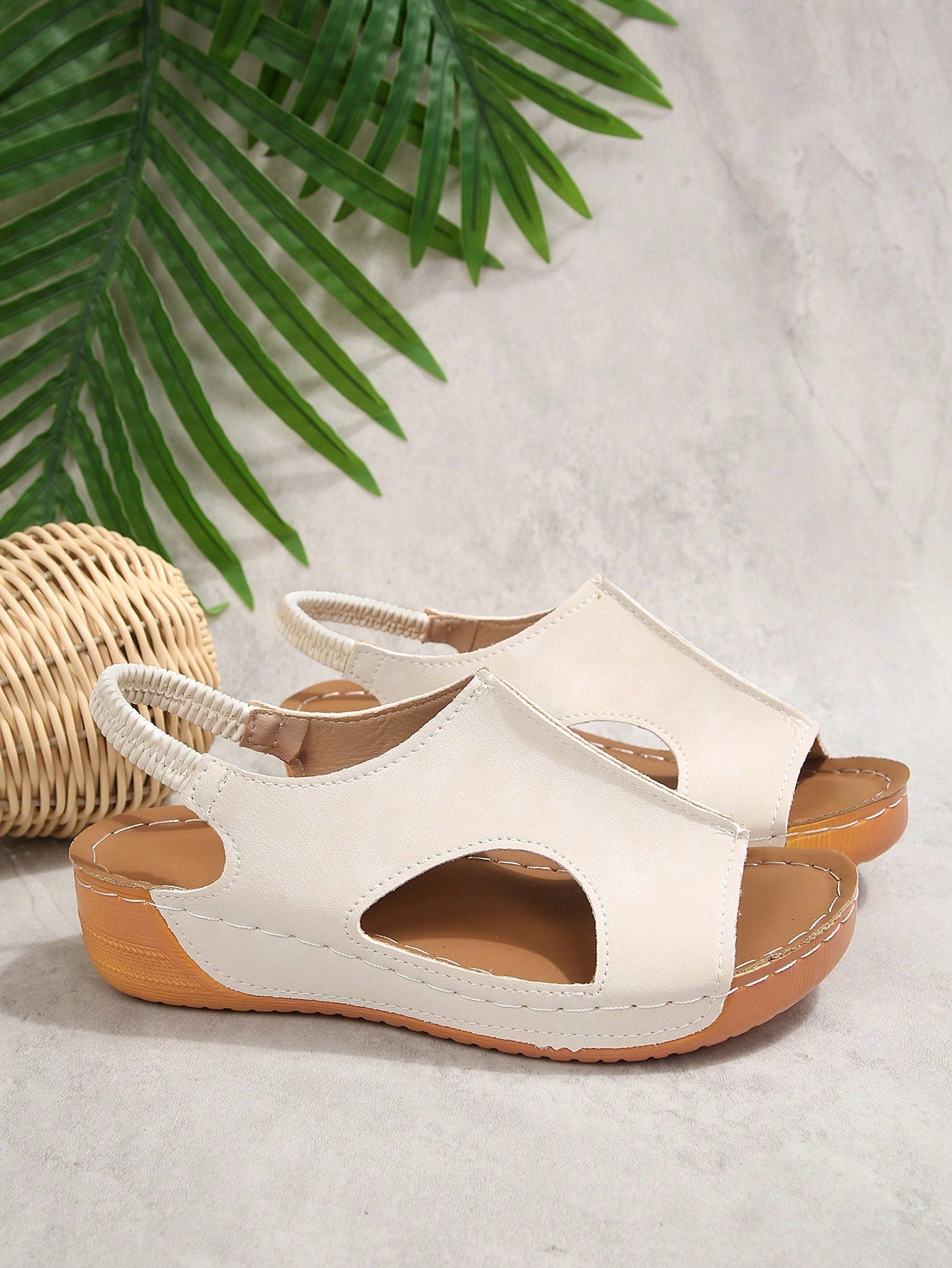 Women’s white PU platform wedge sandals with slip-on design, slingback strap, open round toe, and cut-out details, suitable for beach and vacation wear.