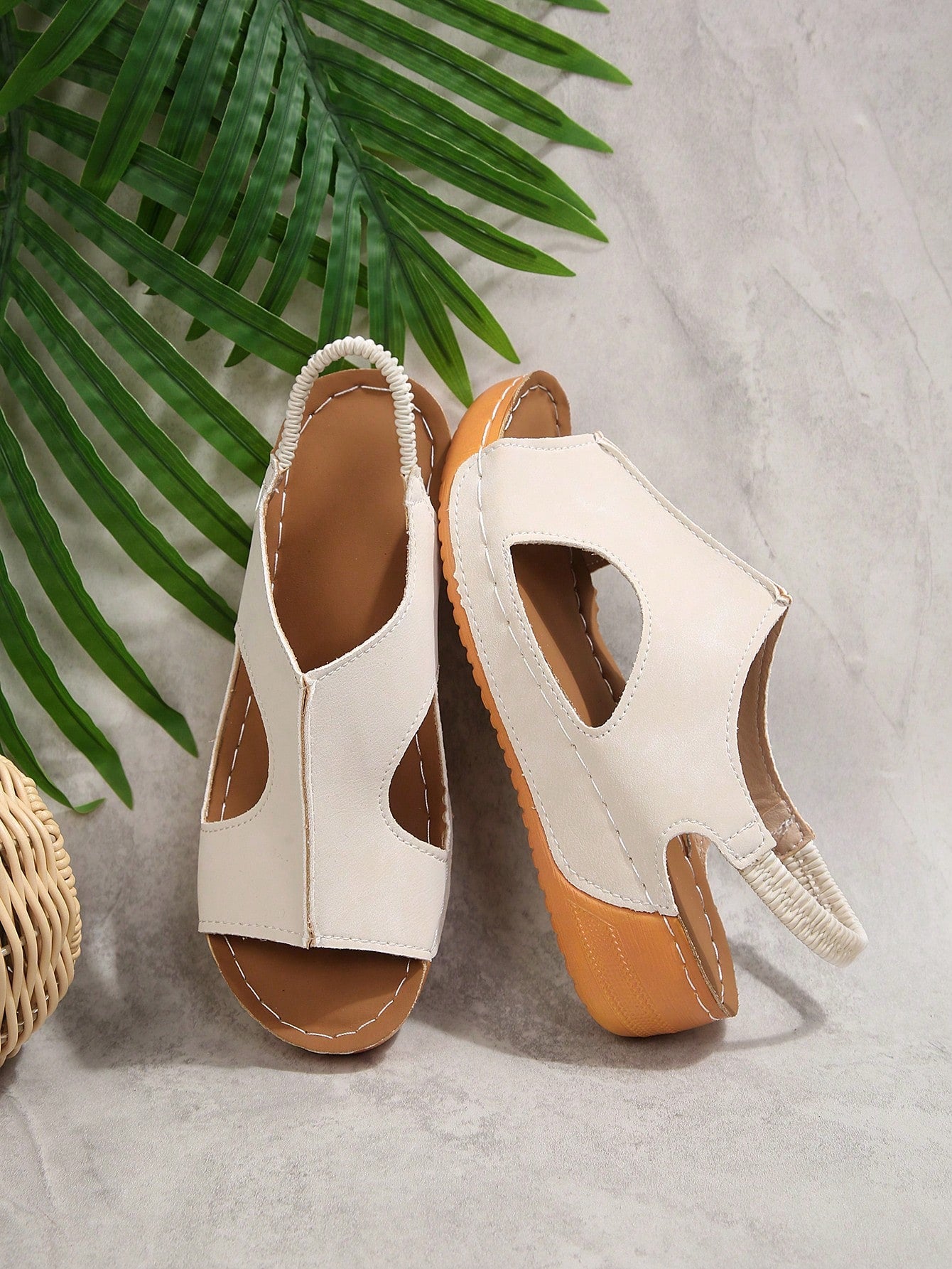 Women’s white PU platform wedge sandals with slip-on design, slingback strap, open round toe, and cut-out details, suitable for beach and vacation wear.
