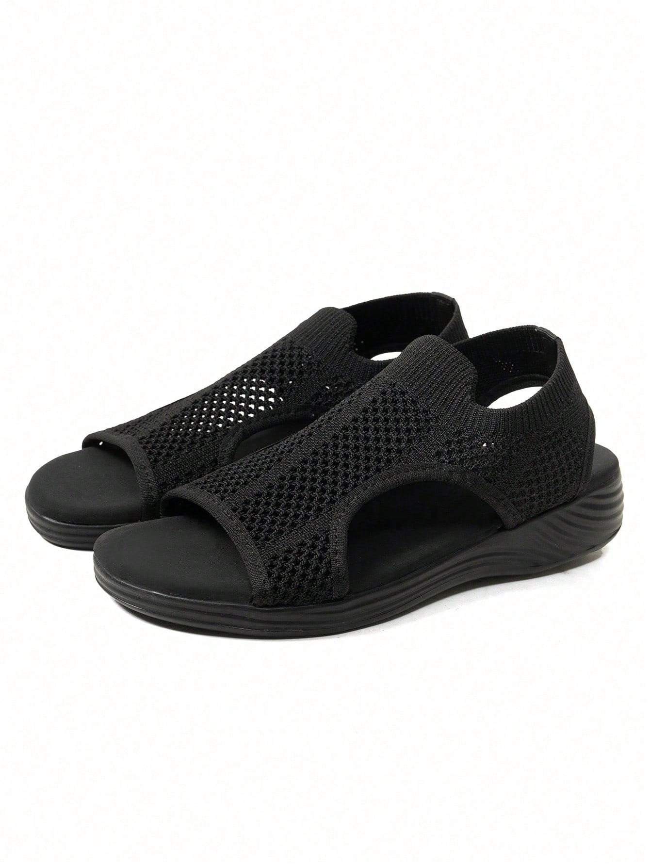 Plus size women's slip-on wedge slide sandals with open toe, low platform heel, and breathable cutout fabric upper, shown as a casual outdoor style sandal.