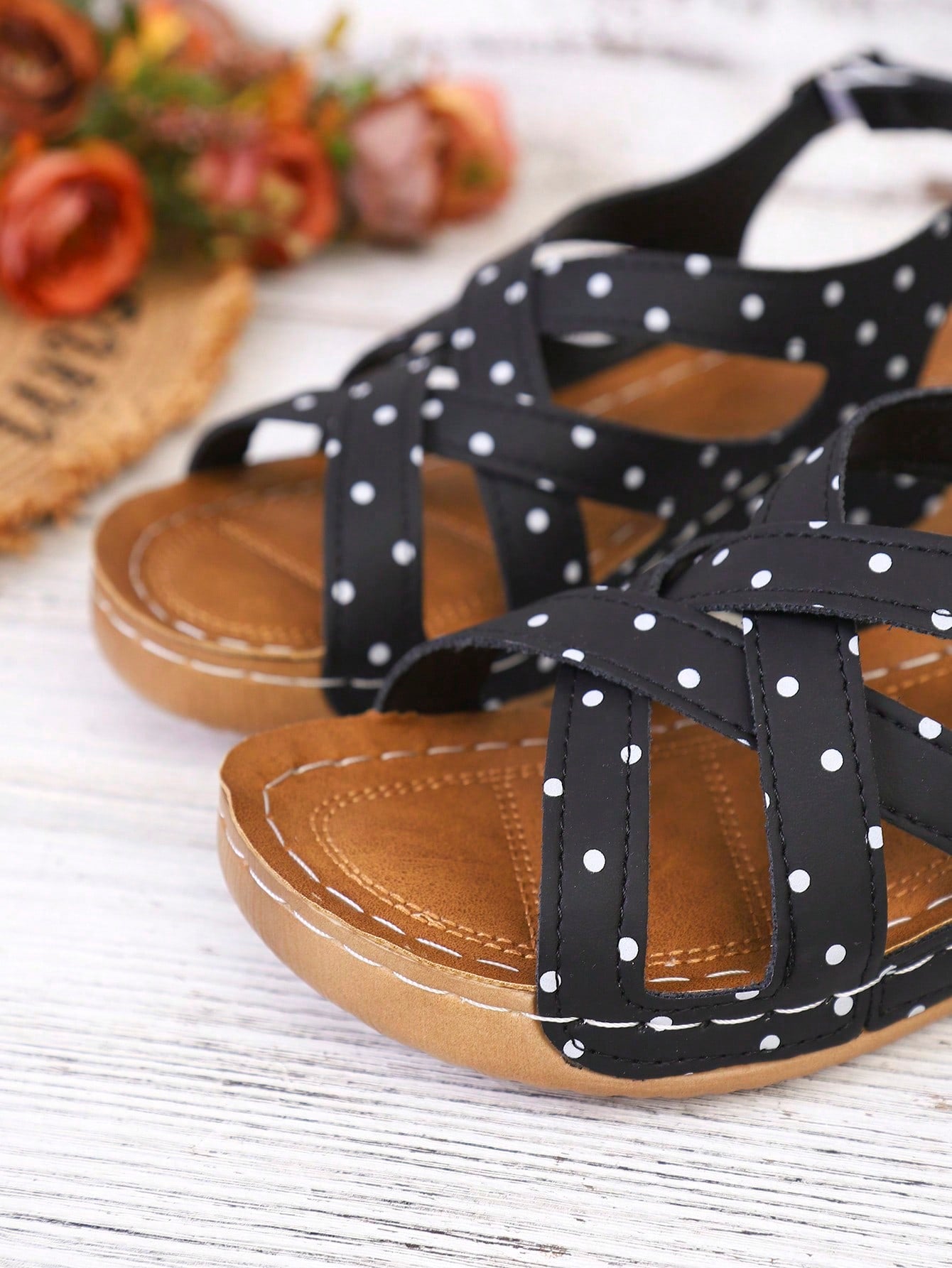 Women's open-toe wedge slide sandals with studded hollow-out upper, cross-over straps, buckle closure, and thick soft sole