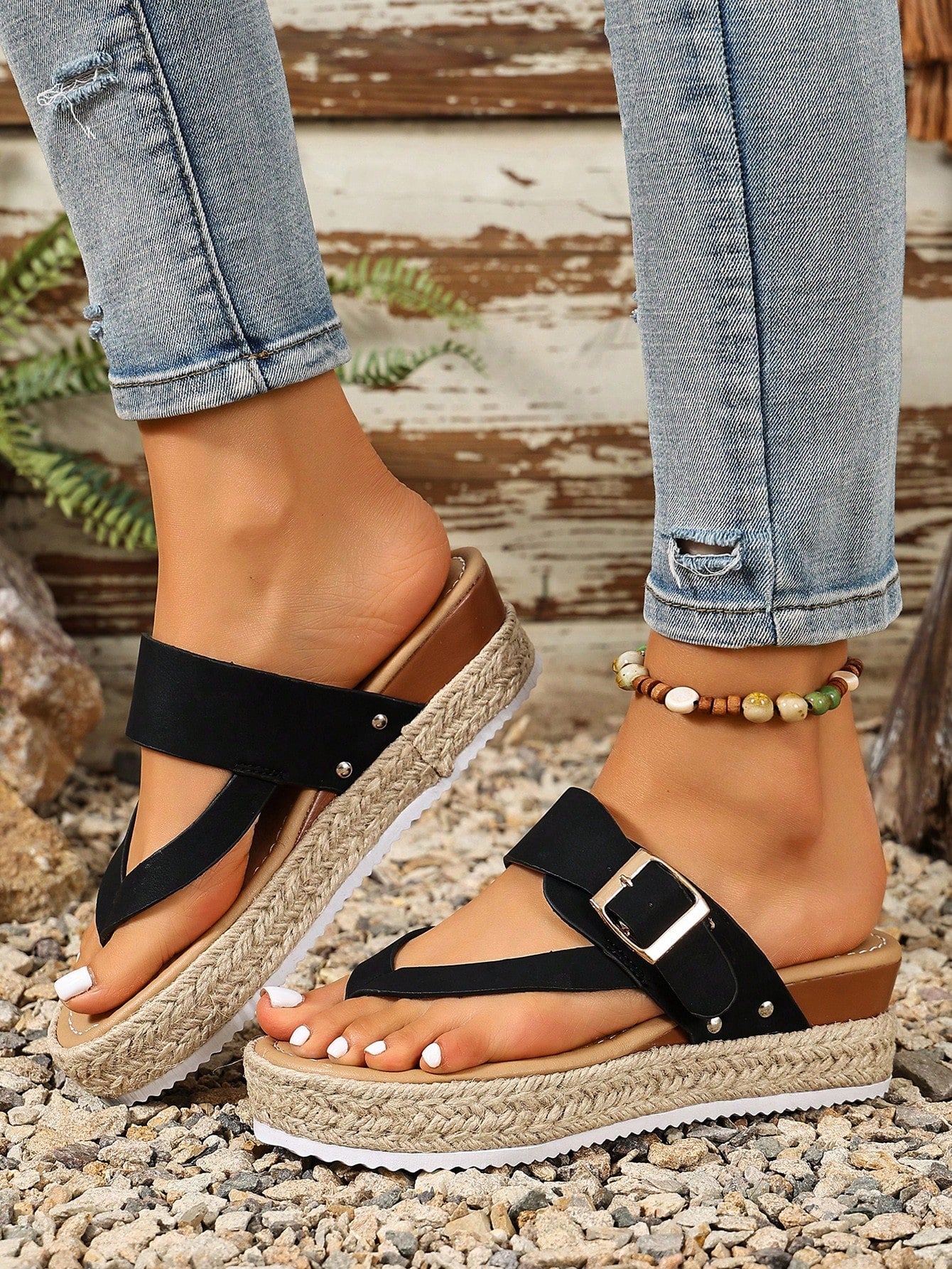 Women's thick sole flip flop sandals with adjustable buckle strap, toe post design, and flatform mid heel in a casual vacation style.
