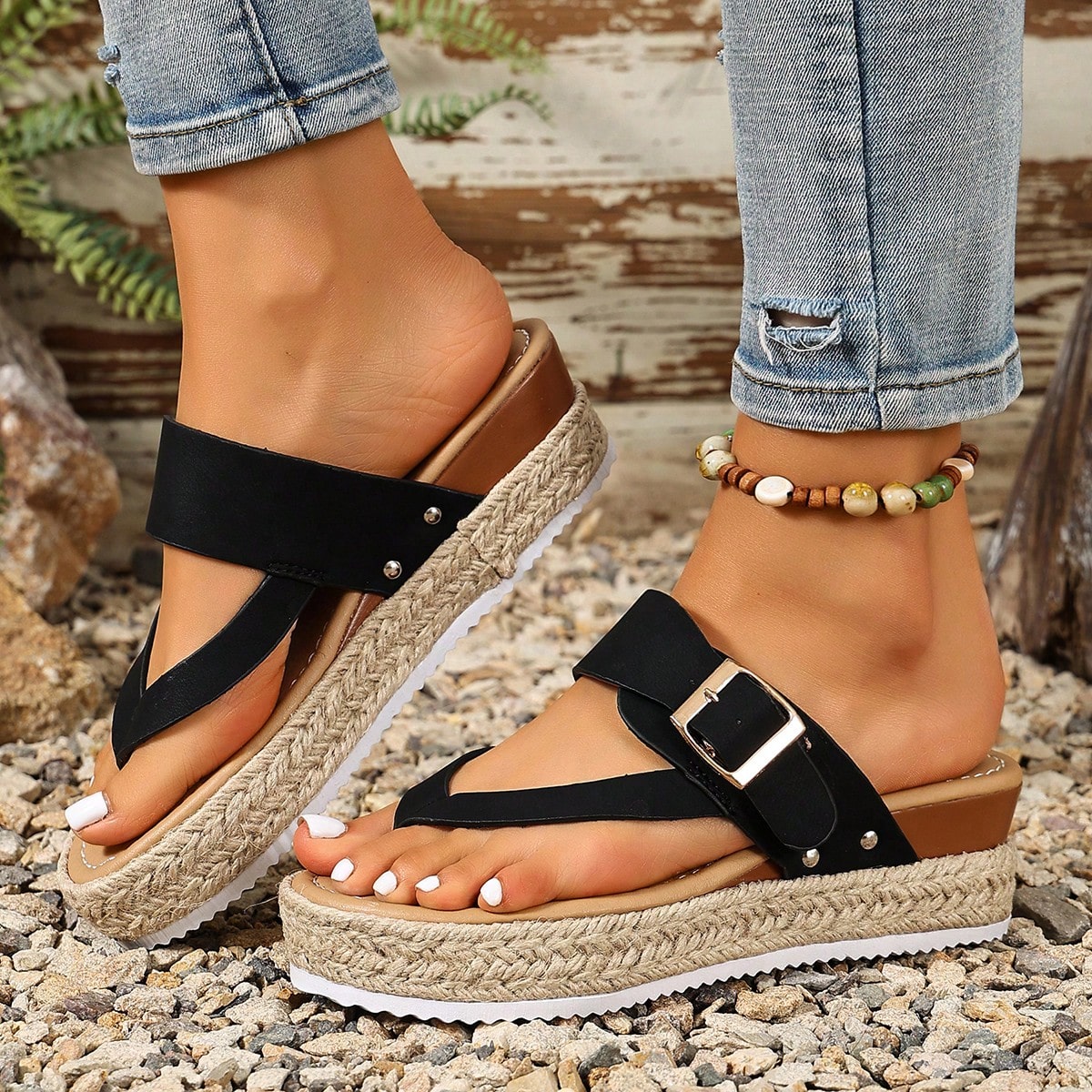 Women's thick sole flip flop sandals with adjustable buckle strap, toe post design, and flatform mid heel in a casual vacation style.