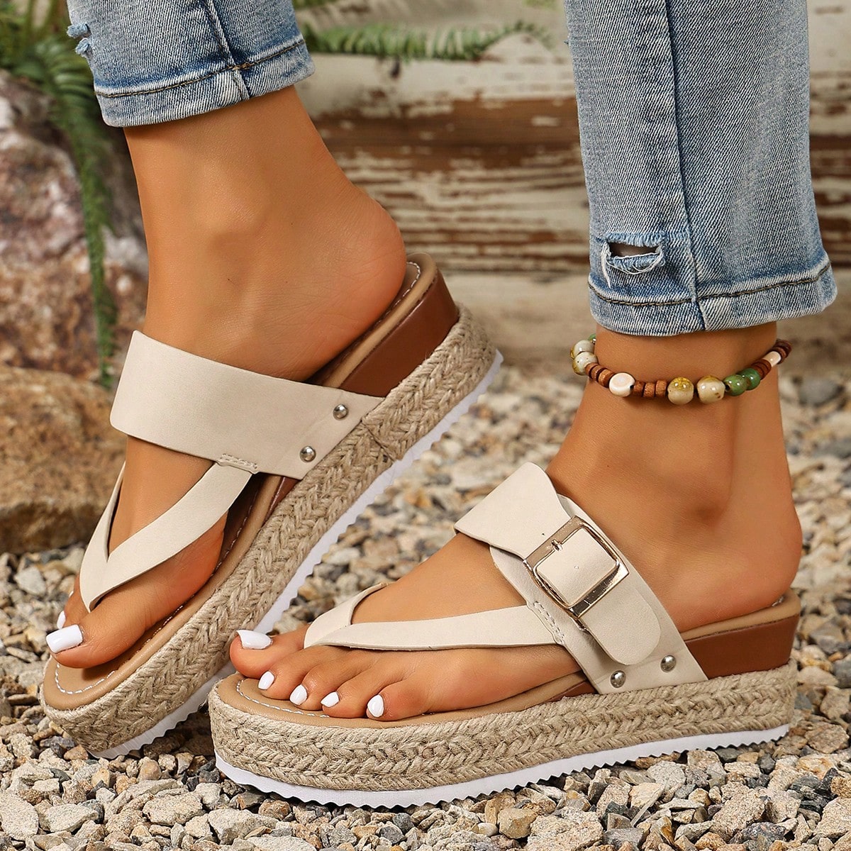 Women's thick sole flip flop sandals with adjustable buckle strap, toe post design, and flatform mid heel in a casual vacation style.