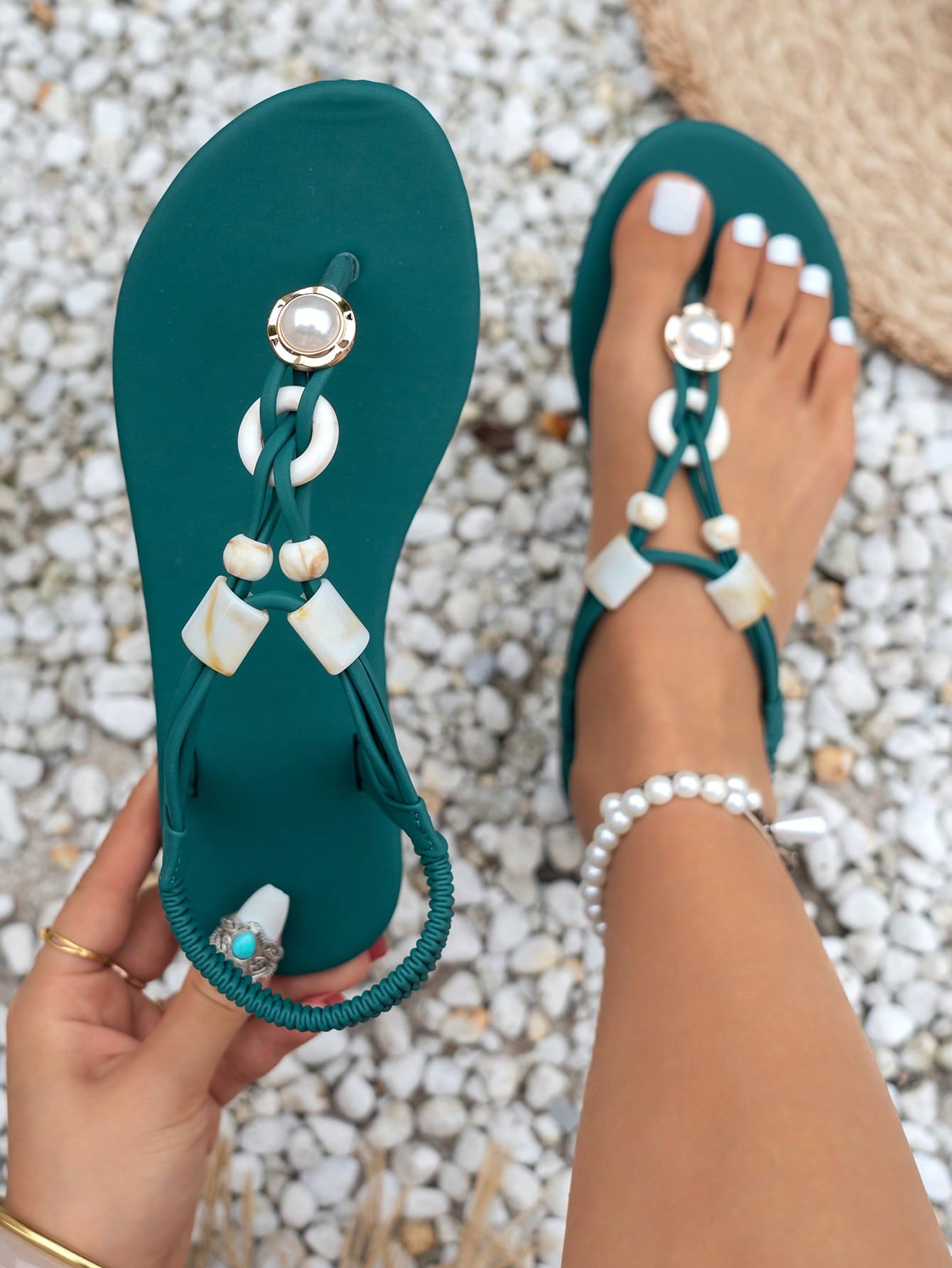 Women's beaded woven flip flop thong sandals with flat soft sole, toe-post design, and beach-style plant pattern detailing.