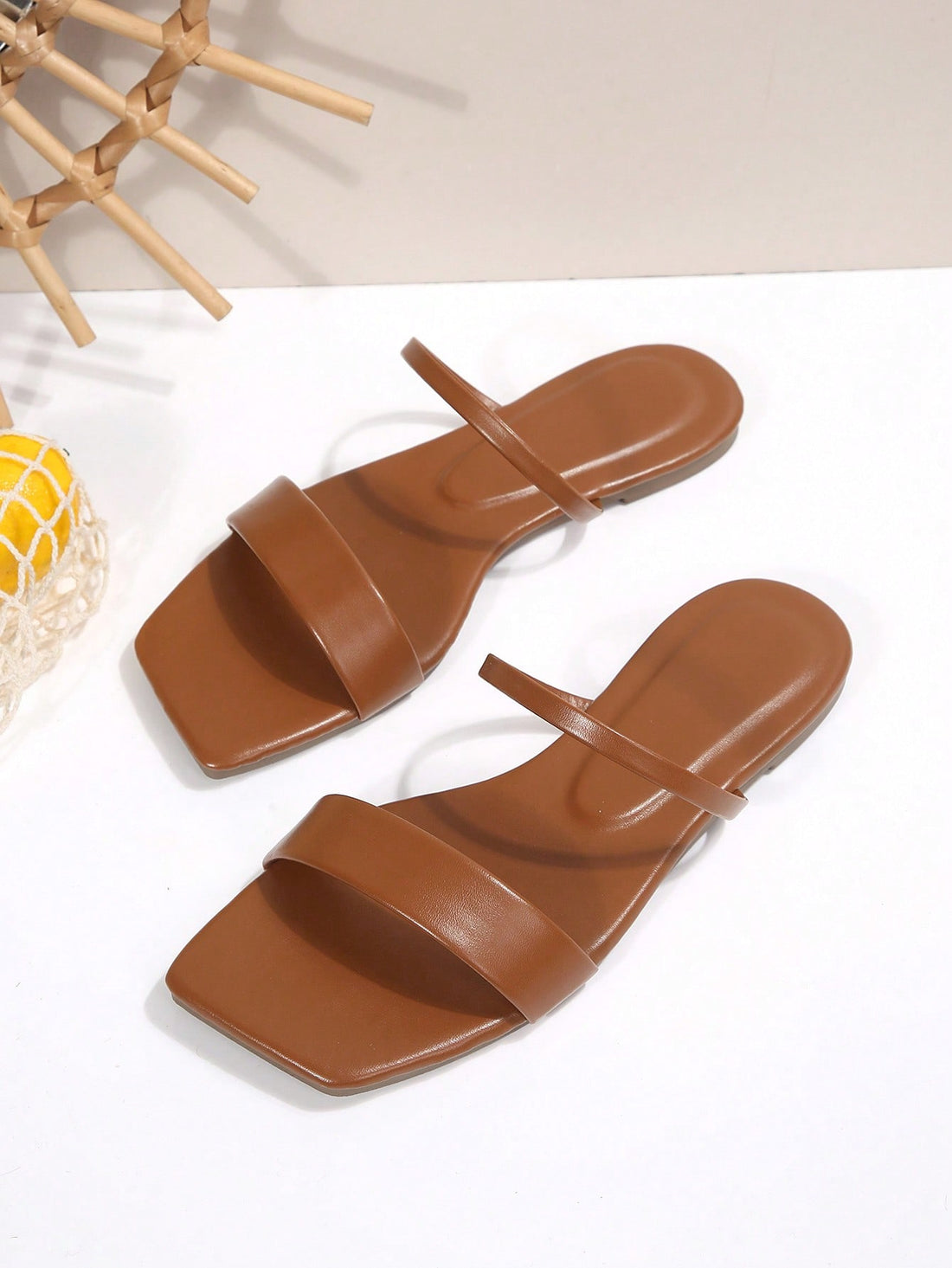 Women’s square toe flat slide sandals with open toe, slip-on style, and ruffle/plain detail for beach and casual outdoor wear.