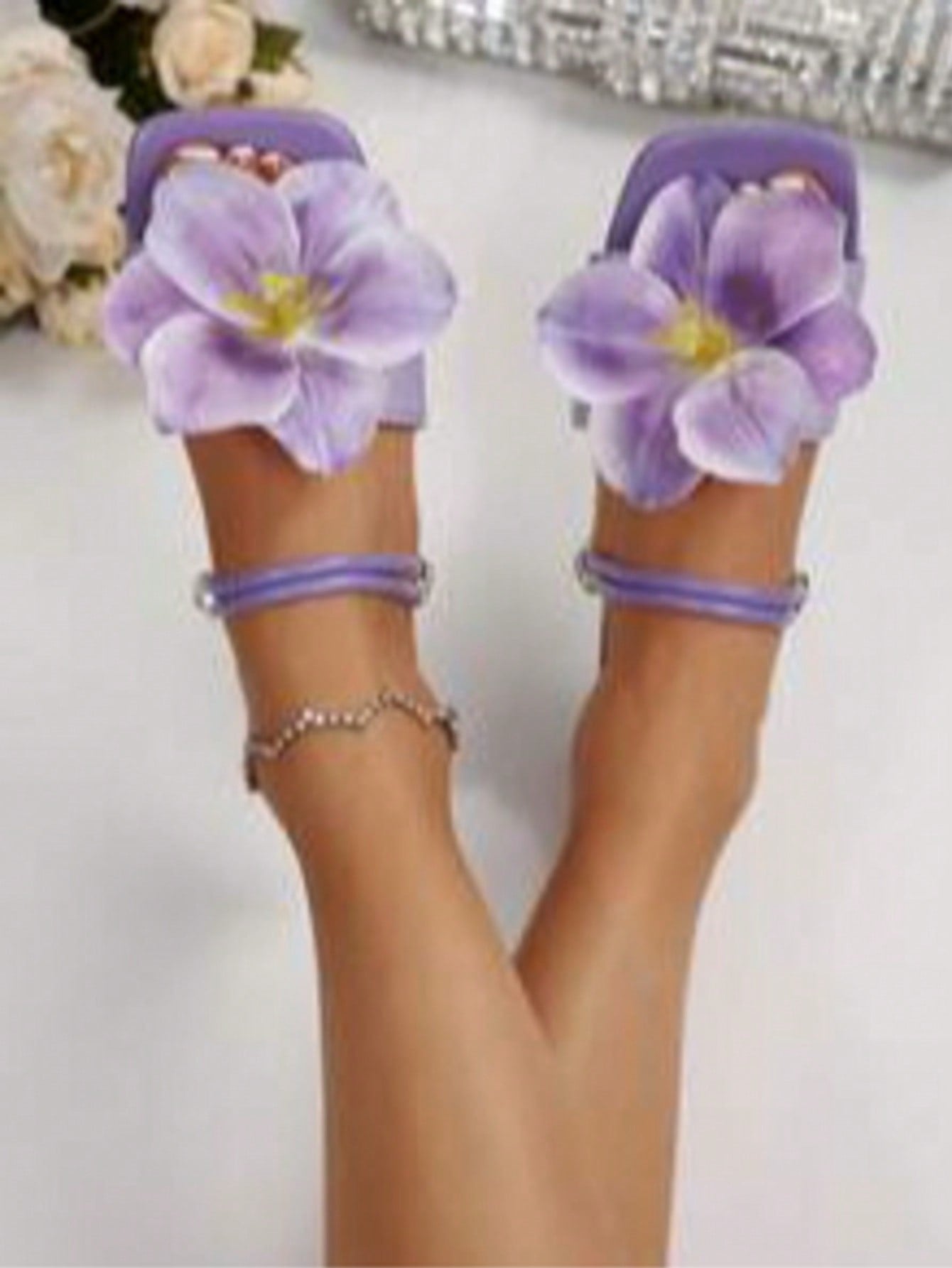 Women's open-toe flat slide sandals with a single strap and applique detail, glamorous casual style for beach and daily wear.
