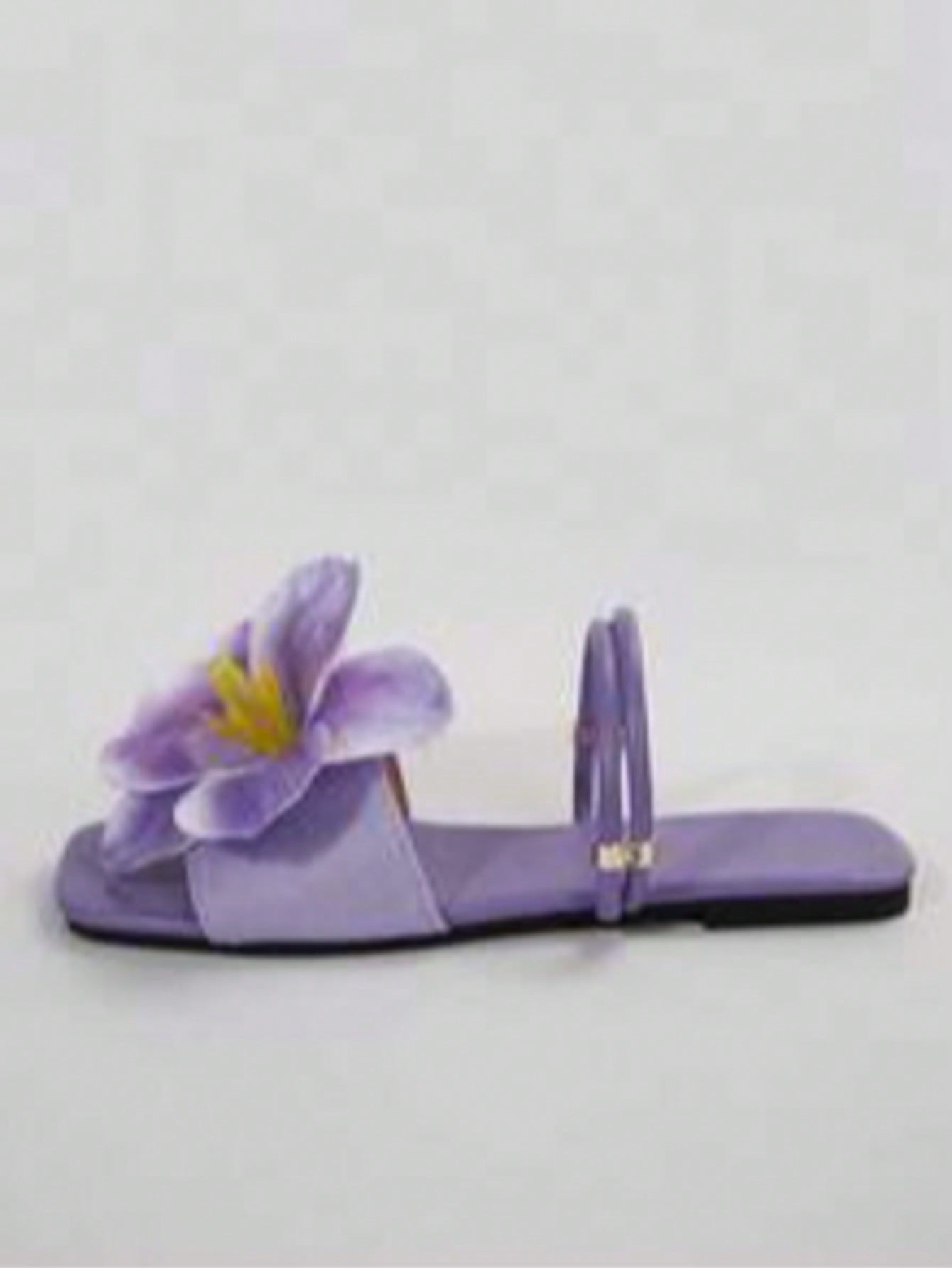 Women's open-toe flat slide sandals with a single strap and applique detail, glamorous casual style for beach and daily wear.