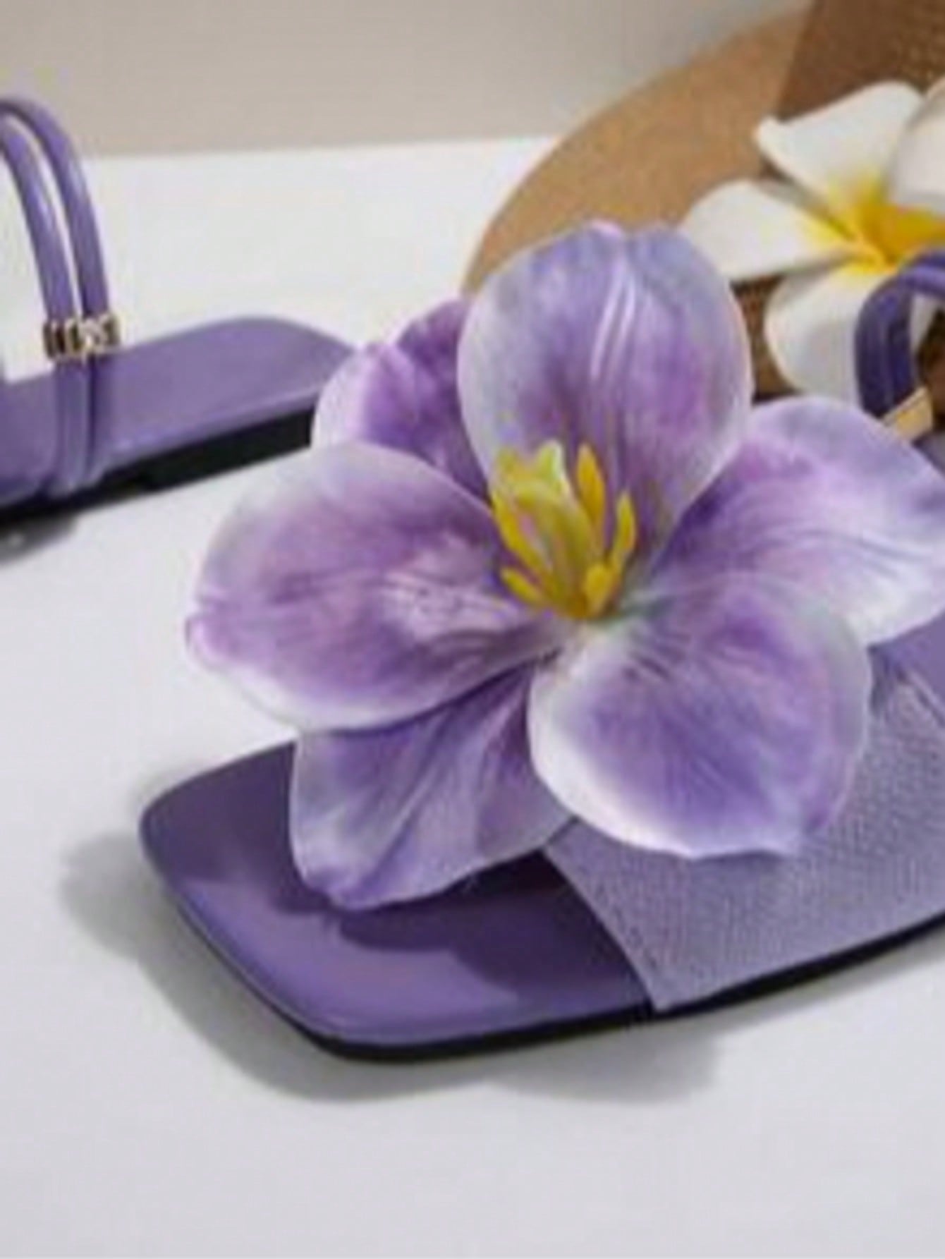 Women's open-toe flat slide sandals with a single strap and applique detail, glamorous casual style for beach and daily wear.