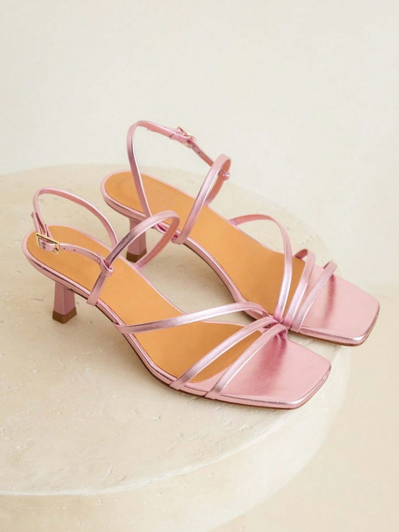 Elegant women’s slip-on high heel sandals with a square toe, bowknot detail, textured upper, stiletto heel, and slingback toe-post design.