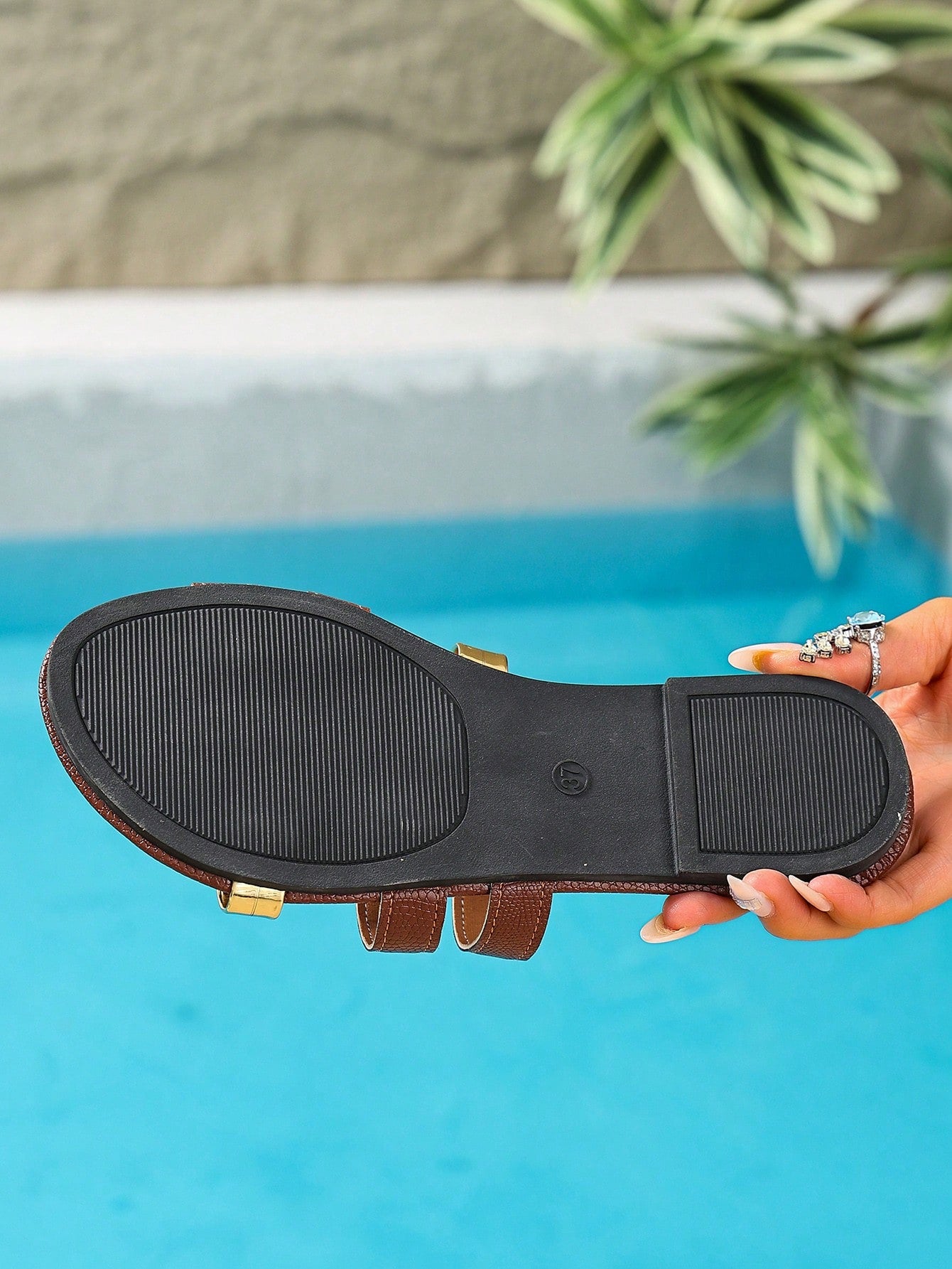 Women's yellow open-toe flat slide sandals featuring a cut-out design and textured plain pattern for casual beach and daily wear.