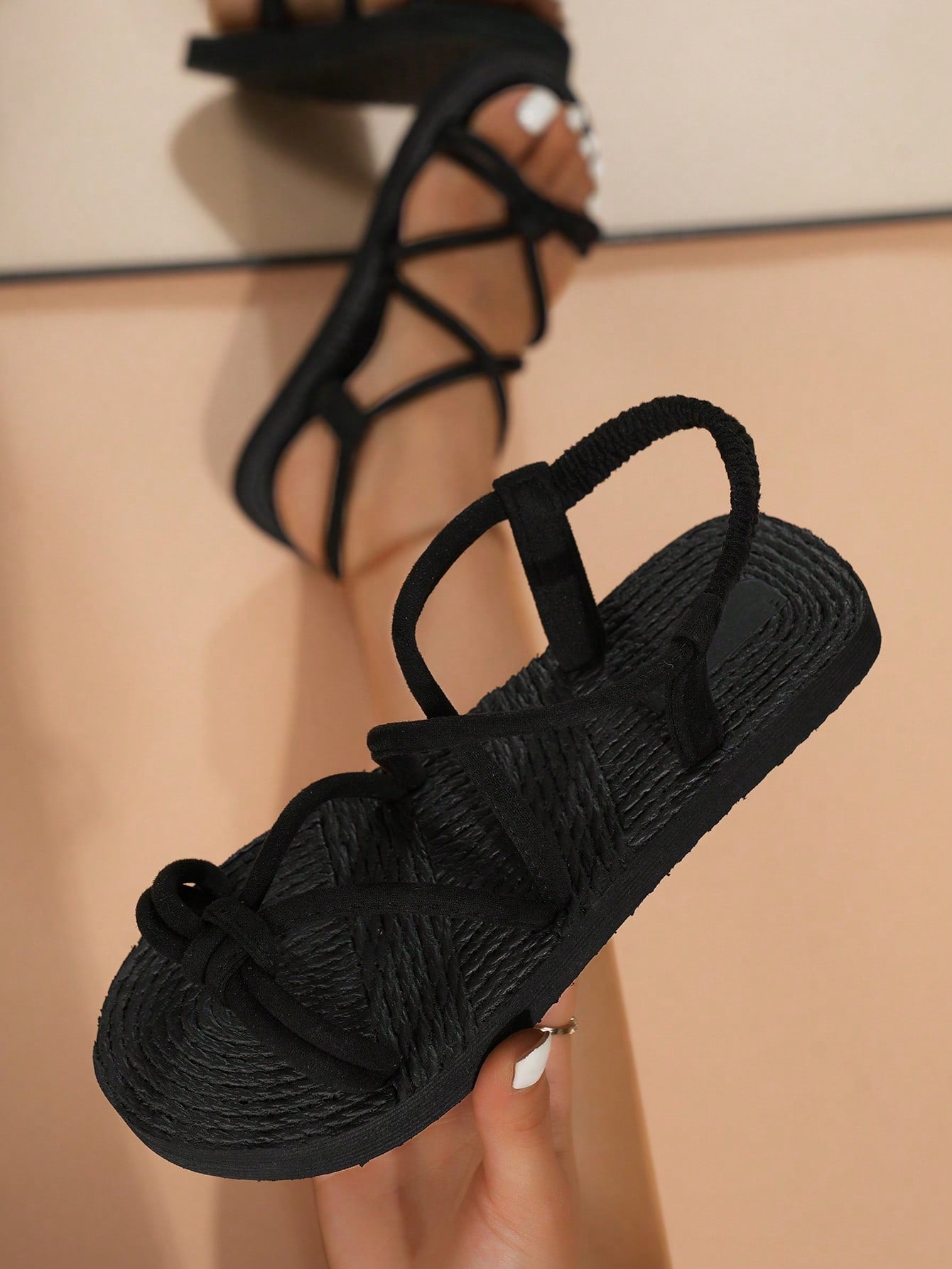 Women's colorblock flat slide sandals with criss cross strap, toe post, cloth tape and fleece detail, finished with sequin, crystal, gemstone, and knot accents.