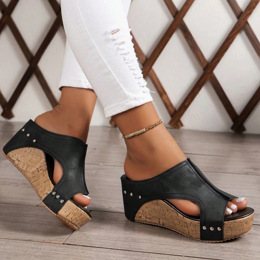Women's plain slip-on slippers with a round toe, platform sole, and studded details, designed for casual daily wear and vacation outfits.