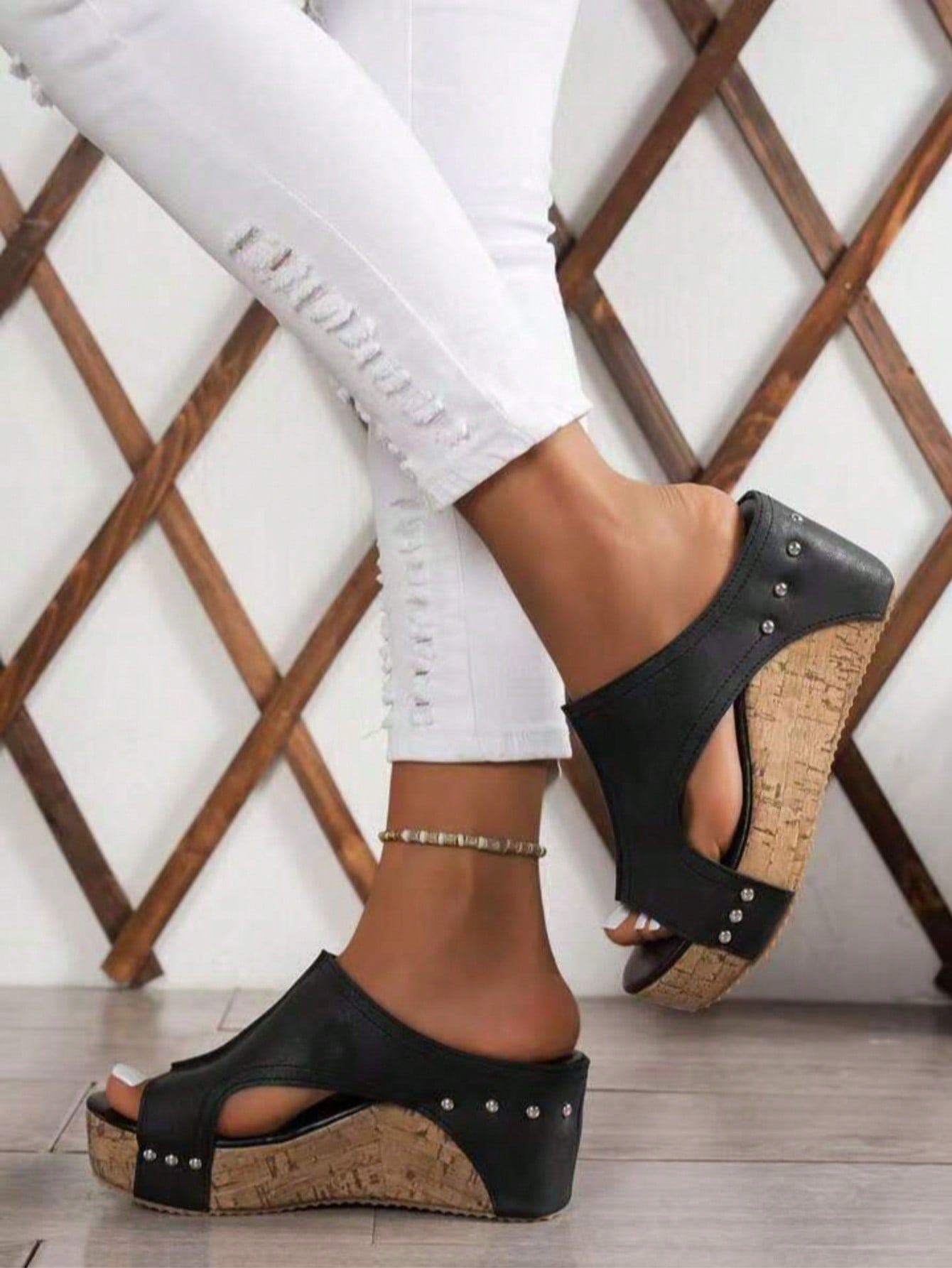 Women's plain slip-on slippers with a round toe, platform sole, and studded details, designed for casual daily wear and vacation outfits.