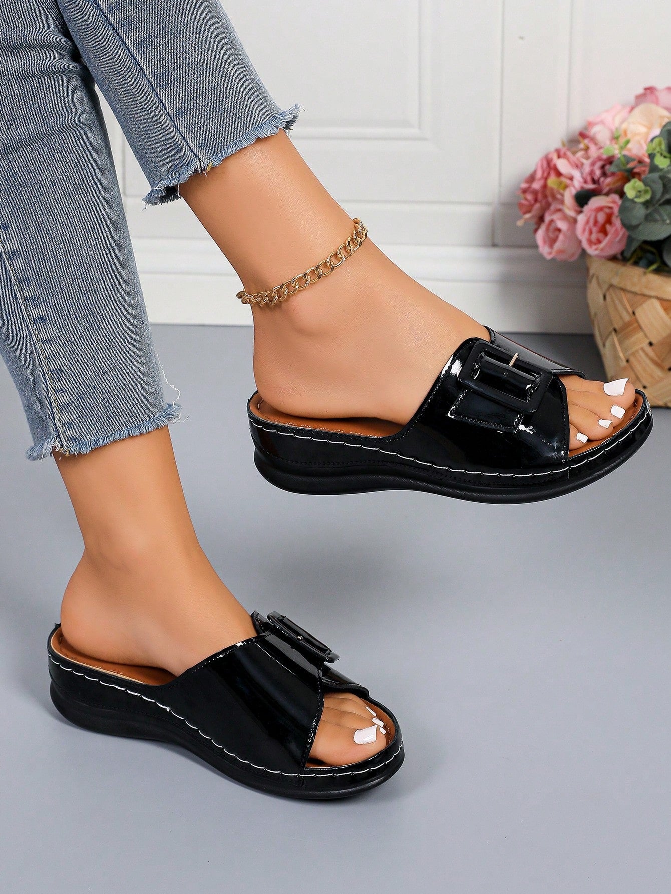 Women's multicolor wedge slide sandals with open toe, criss-cross straps, cut-out details, slip-on closure, and mid chunky wedge heel.