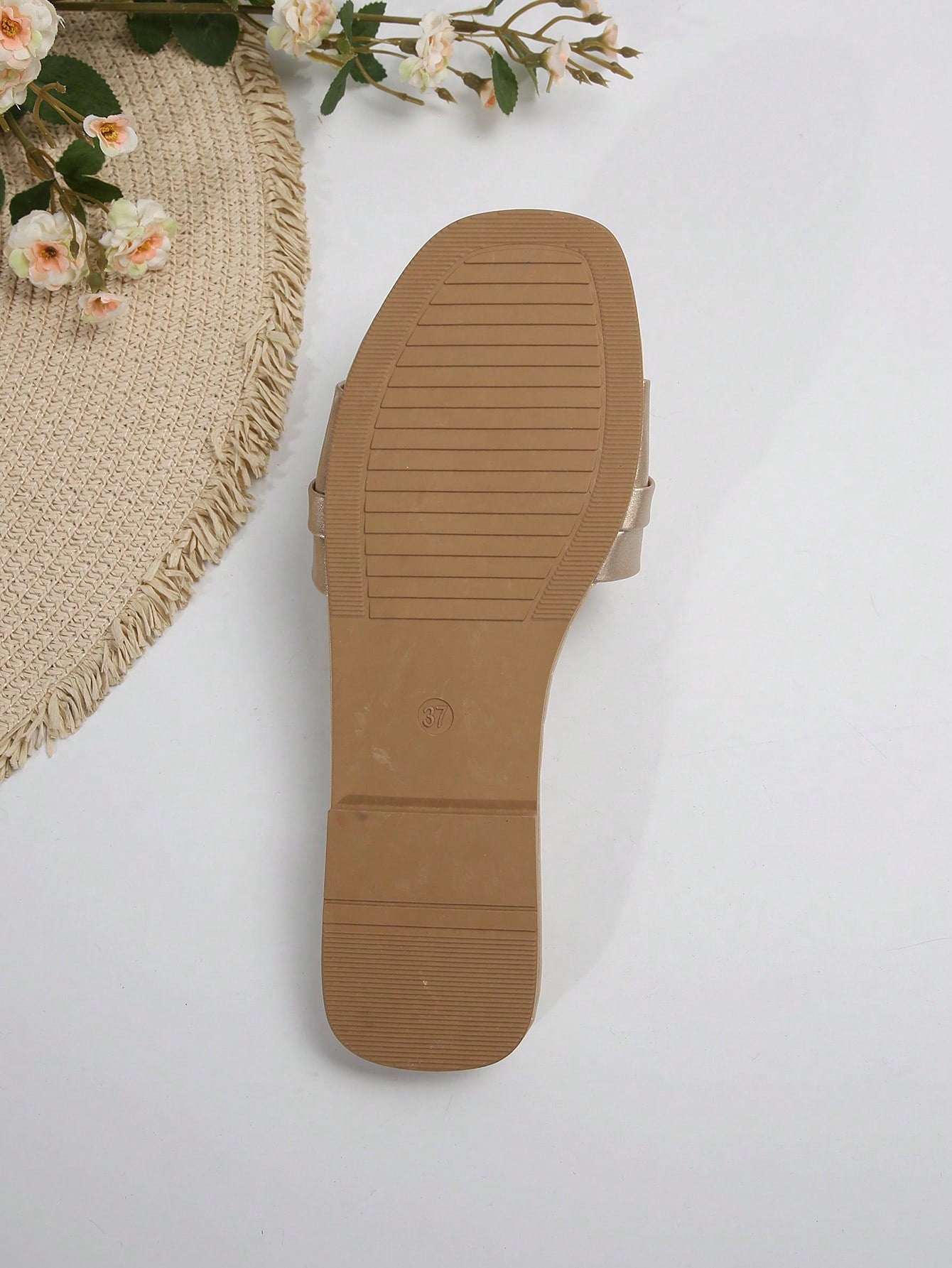 Women's gold-tone slip-on slide sandals with open toe and chain link detailing, shown as casual flat sandals for indoor and outdoor use.