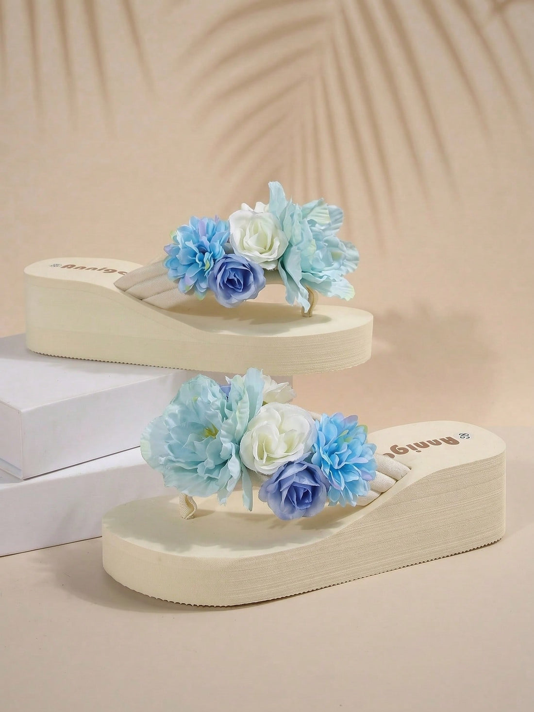 Women’s wedge platform flip flop slide sandals with floral decor styling, animal pattern design, and mid heel for outdoor and holiday wear.