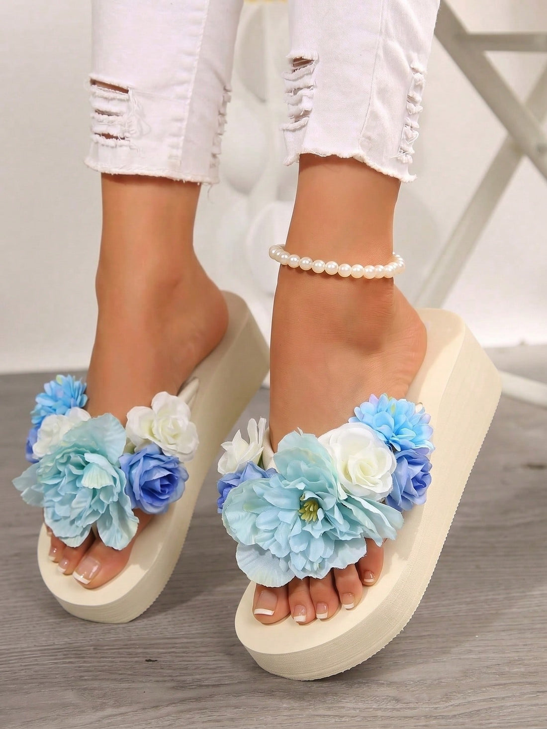 Women’s wedge platform flip flop slide sandals with floral decor styling, animal pattern design, and mid heel for outdoor and holiday wear.