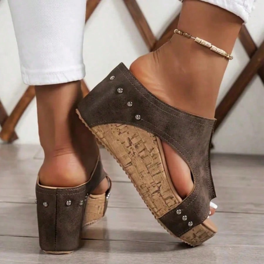 Women's plain slip-on slippers with a round toe, platform sole, and studded details, designed for casual daily wear and vacation outfits.