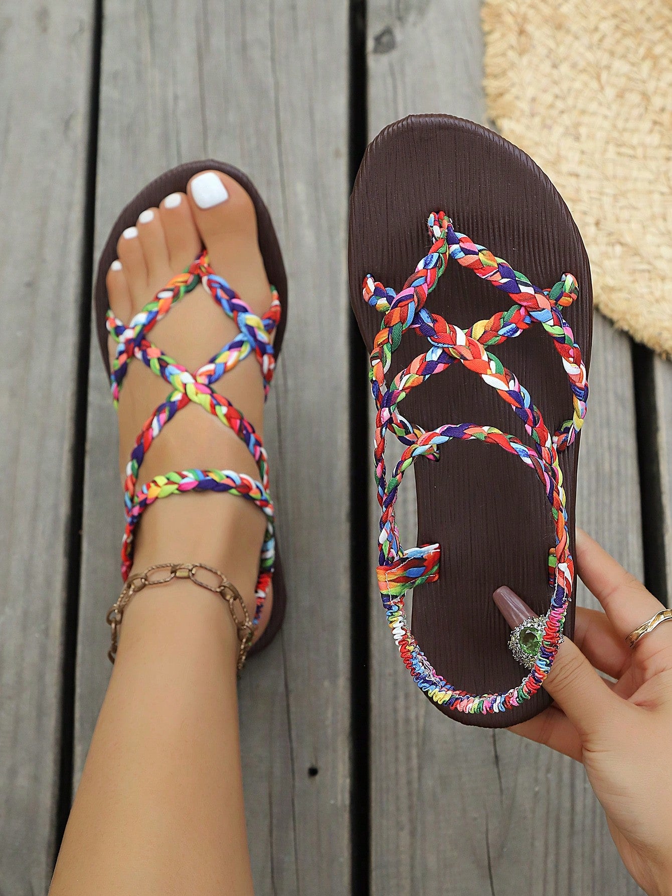 Open-toe flat slide sandals featuring rhinestone leaf decoration in a vacation-inspired style.