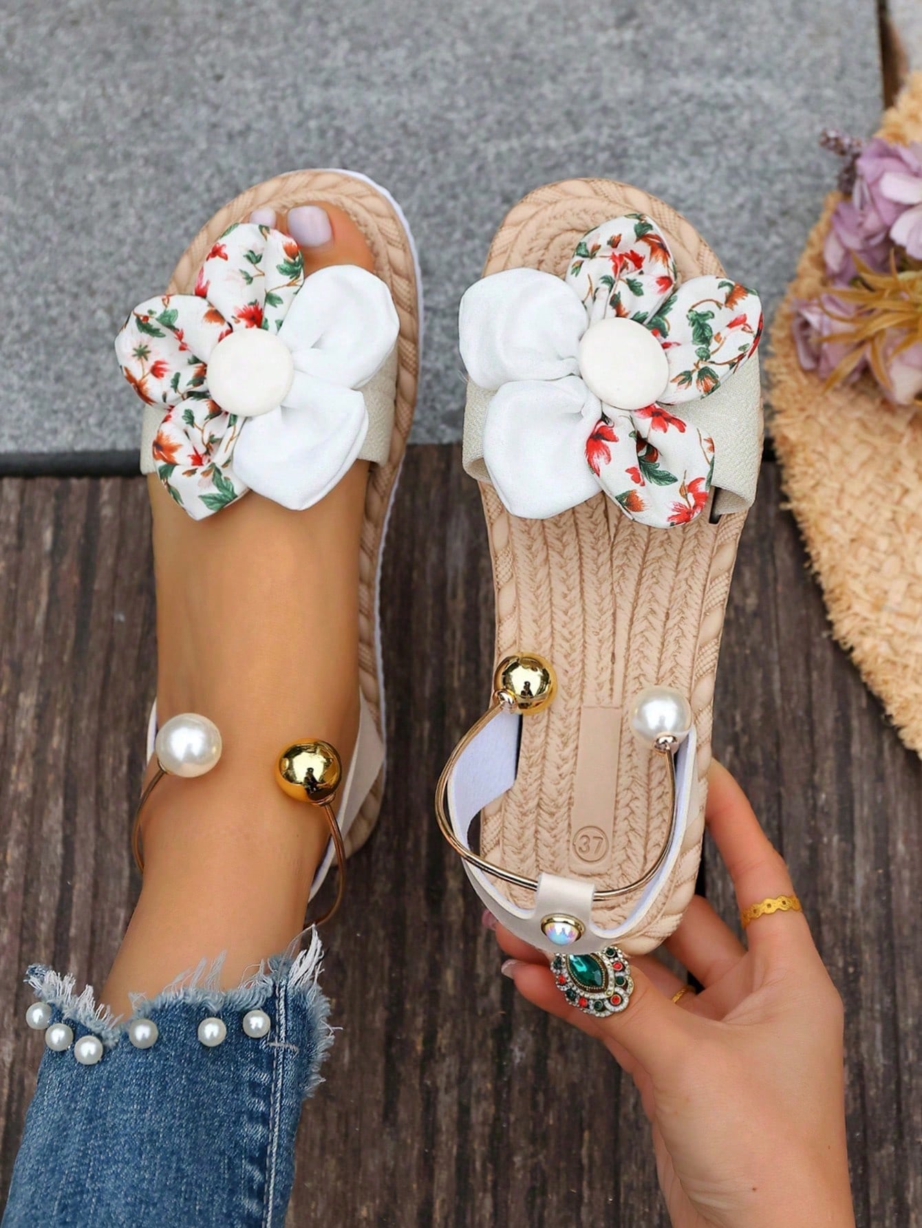 Women's floral beach slip-on flat sandals with soft non-slip sole and classic open sandal design in beige.