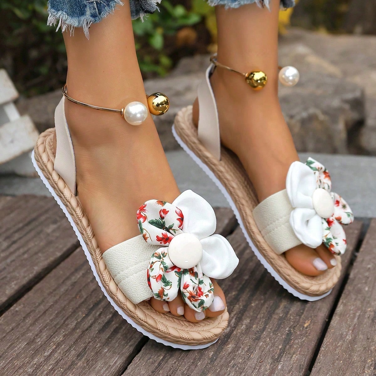 Women's floral beach slip-on flat sandals with soft non-slip sole and classic open sandal design in beige.