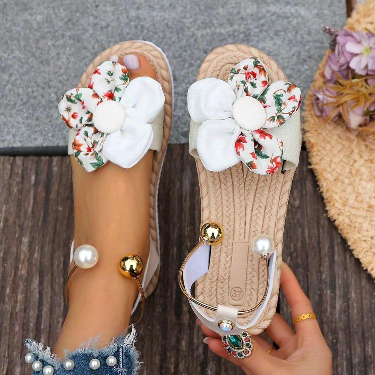 Women's floral beach slip-on flat sandals with soft non-slip sole and classic open sandal design in beige.