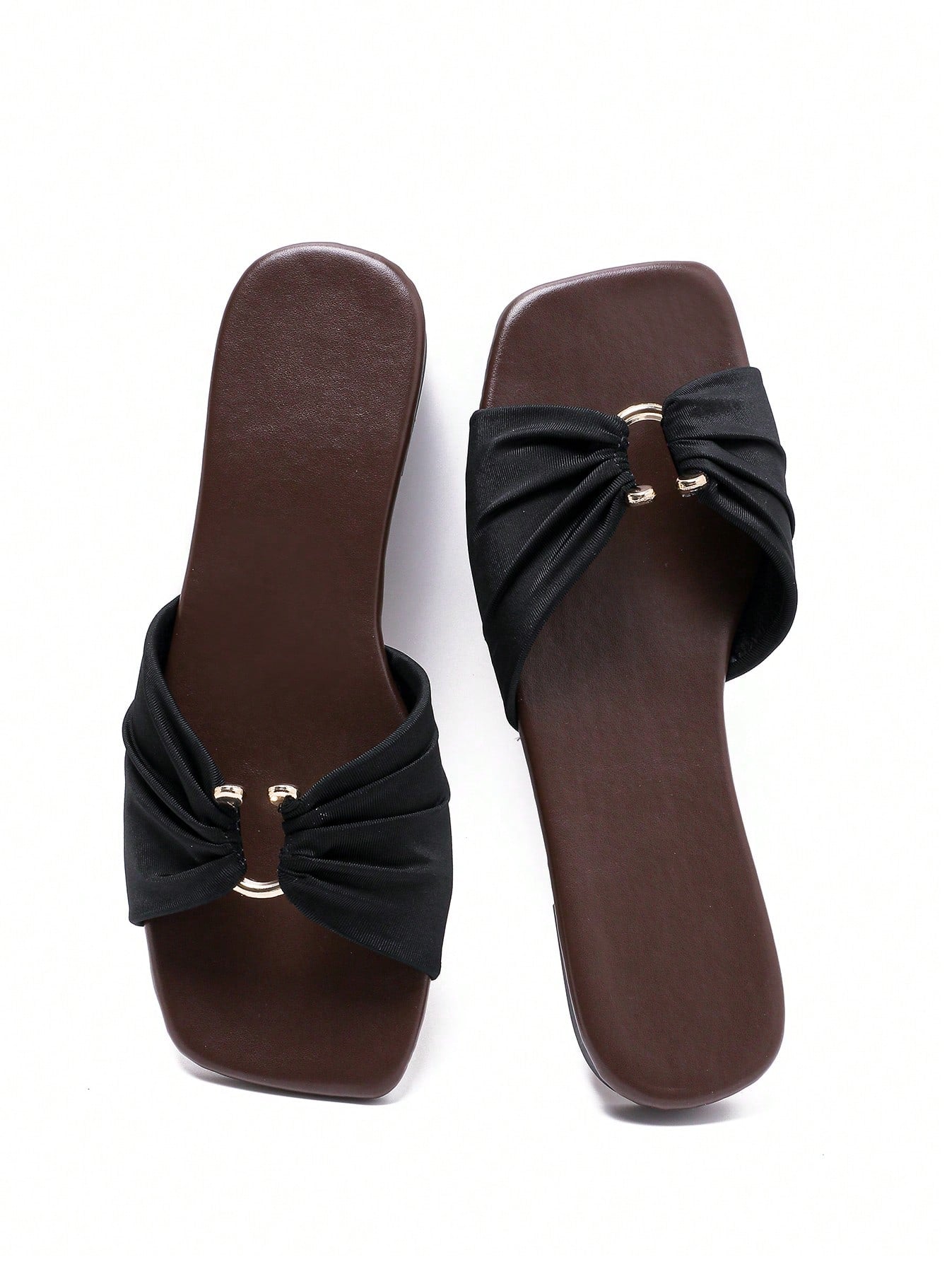 Women's black flat slide sandals with a square open toe and ruched fabric upper.