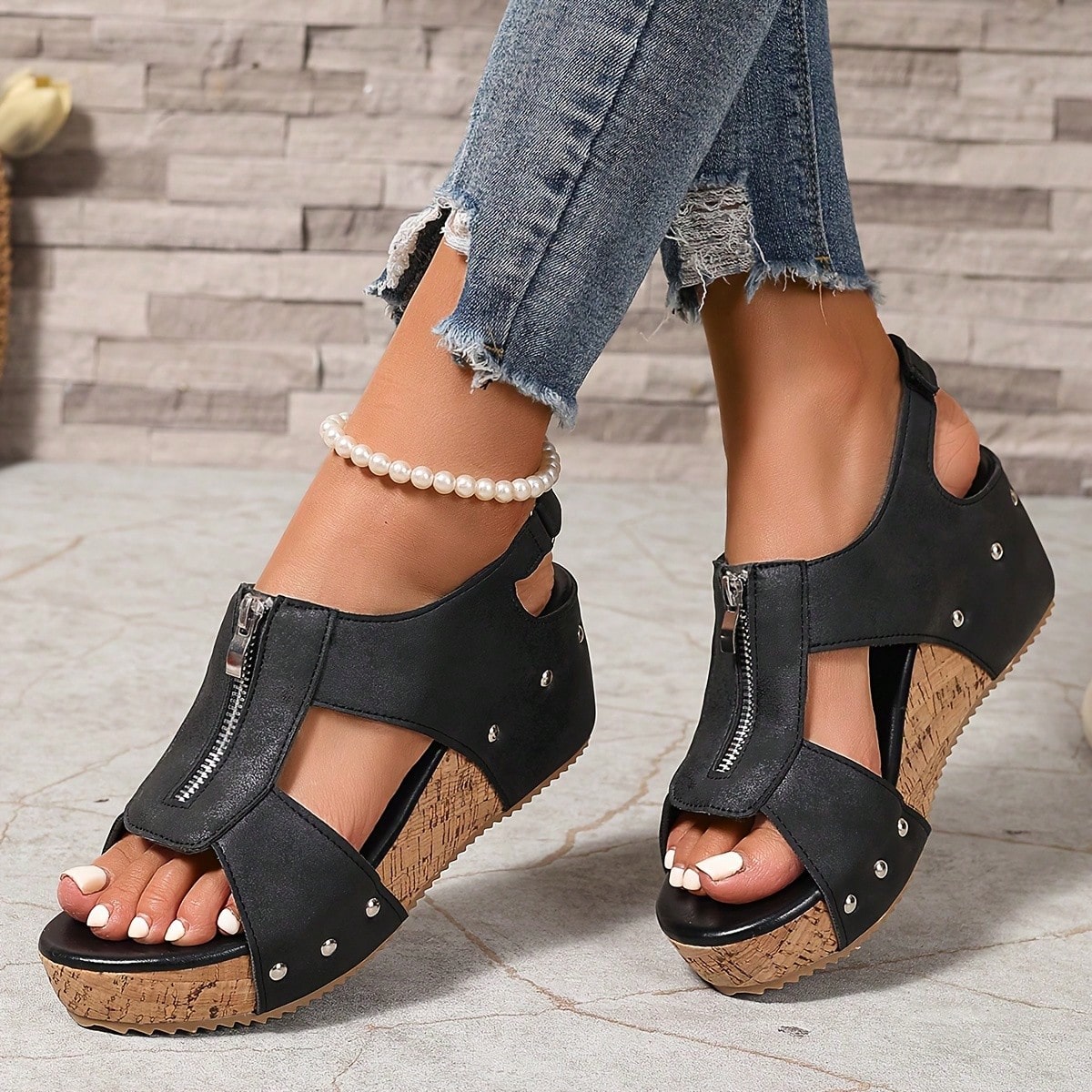 Women's plain slip-on slippers with a round toe, platform sole, and studded details, designed for casual daily wear and vacation outfits.
