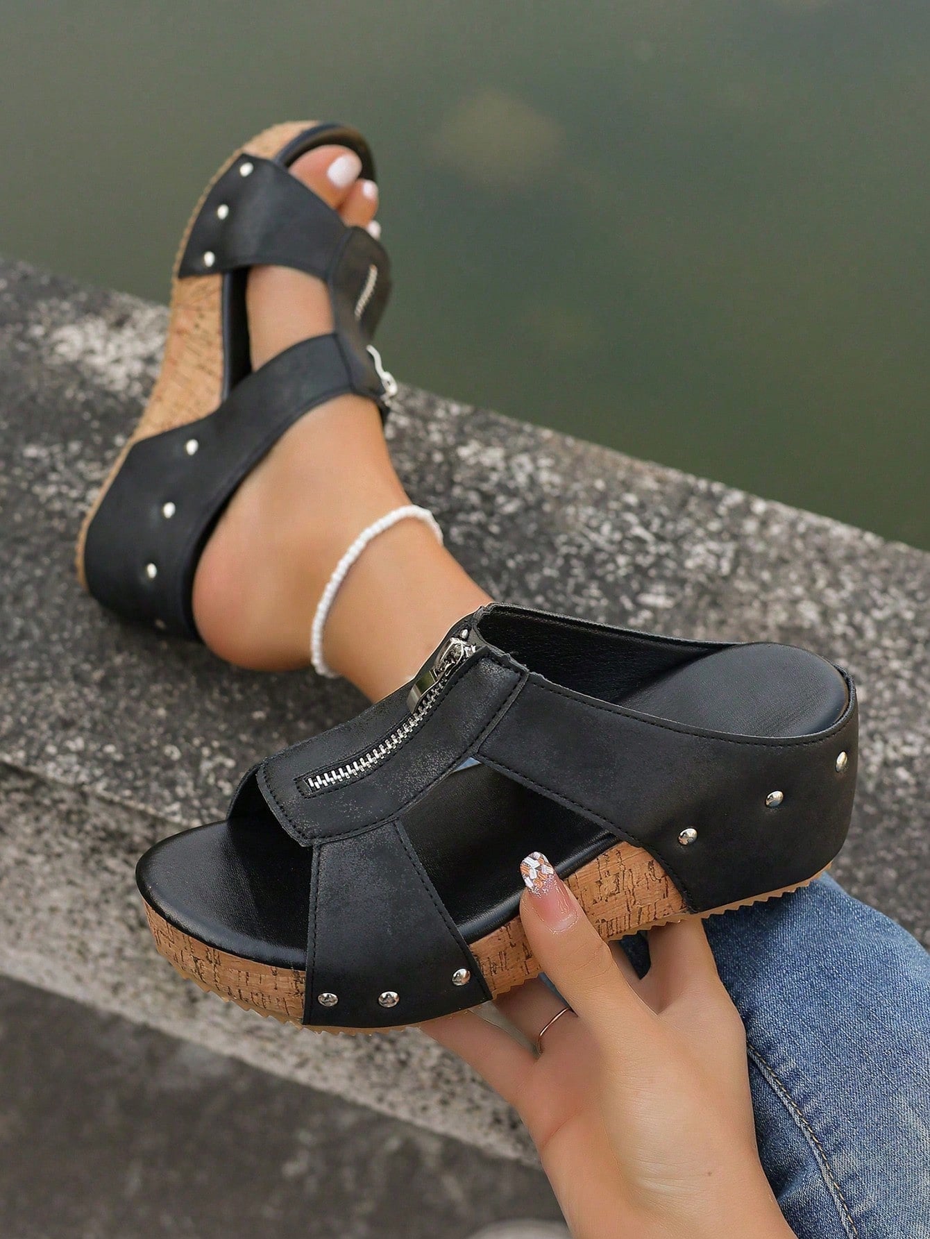 Women's plain slip-on slippers with a round toe, platform sole, and studded details, designed for casual daily wear and vacation outfits.