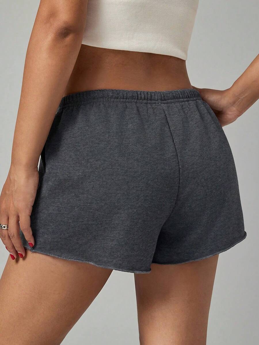 Petite women's burgundy casual track shorts with drawstring waist, raw hem, loose fit, and mini length