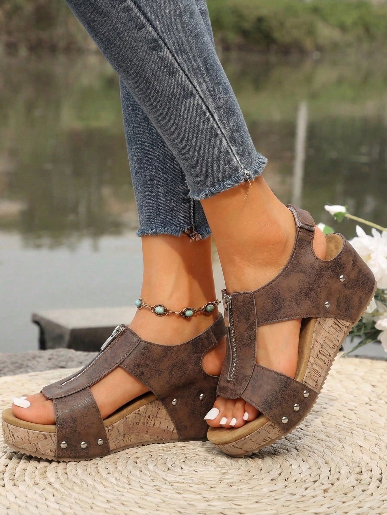 Women's plain slip-on slippers with a round toe, platform sole, and studded details, designed for casual daily wear and vacation outfits.