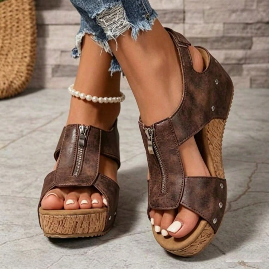 Women's plain slip-on slippers with a round toe, platform sole, and studded details, designed for casual daily wear and vacation outfits.