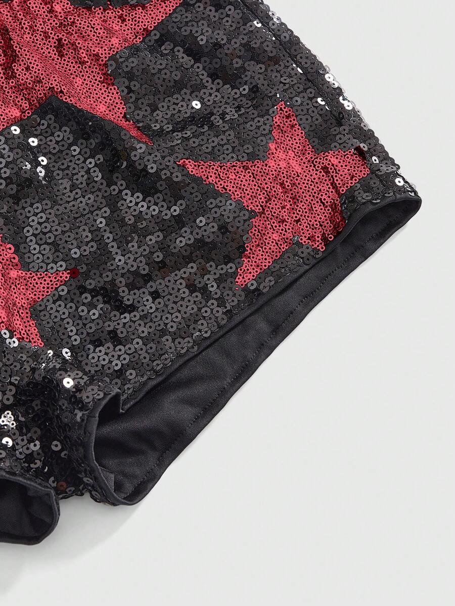Women's black sequin ultra low-waist mini shorts with sparkling pentagram decor, zipper detail, and elastic waist for party, stage, concert, or Halloween wear