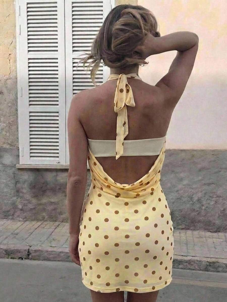 Women's sleeveless halter bodycon mini dress with backless cutout design and knot detail in apricot