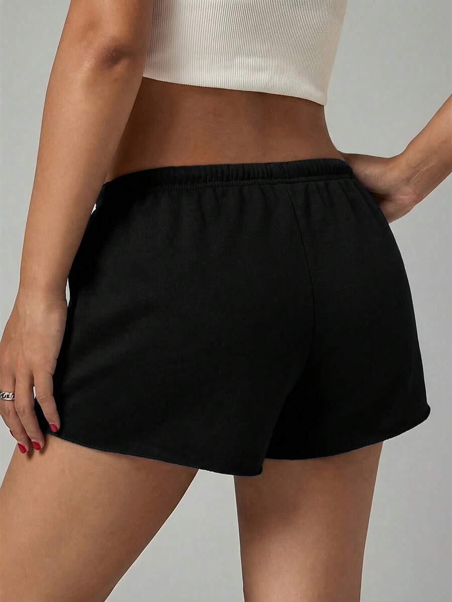 Petite women's burgundy casual track shorts with drawstring waist, raw hem, loose fit, and mini length