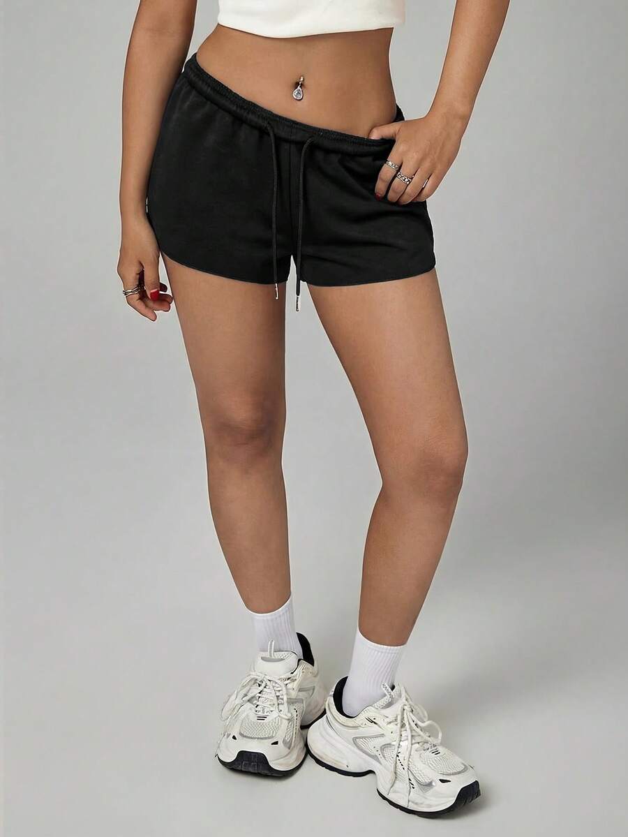 Petite women's burgundy casual track shorts with drawstring waist, raw hem, loose fit, and mini length