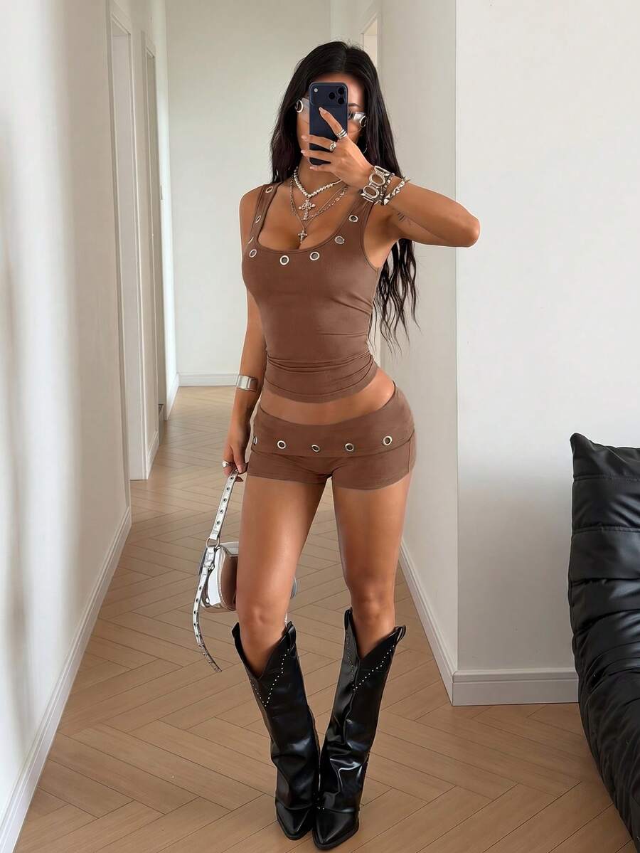 Women's slim fit two-piece set with scoop neck camisole, mini shorts, and studded detail